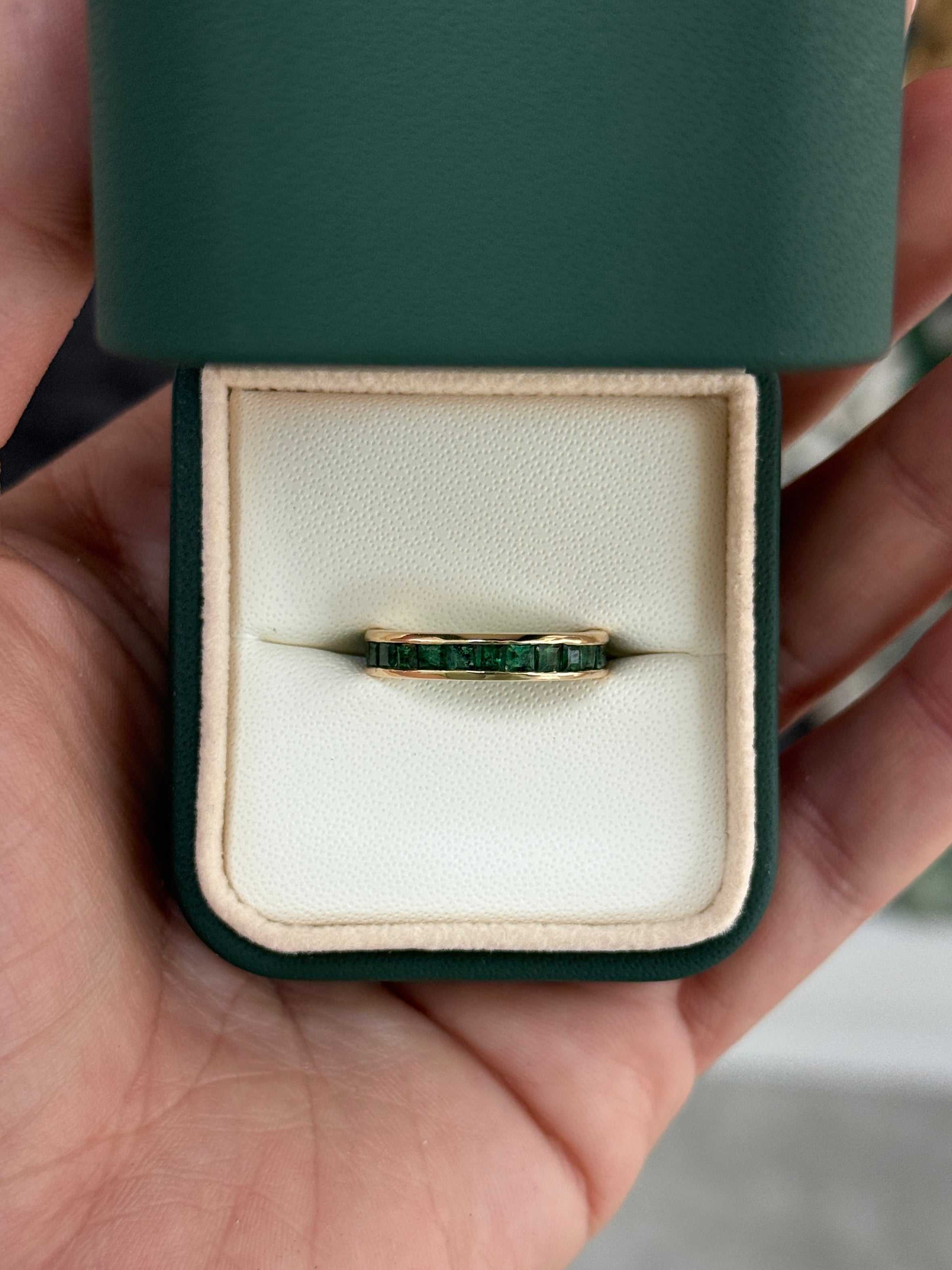JR Colombian Emeralds eternity band with 2.02tcw princess cut natural emeralds in channel setting, size 6 or 8.