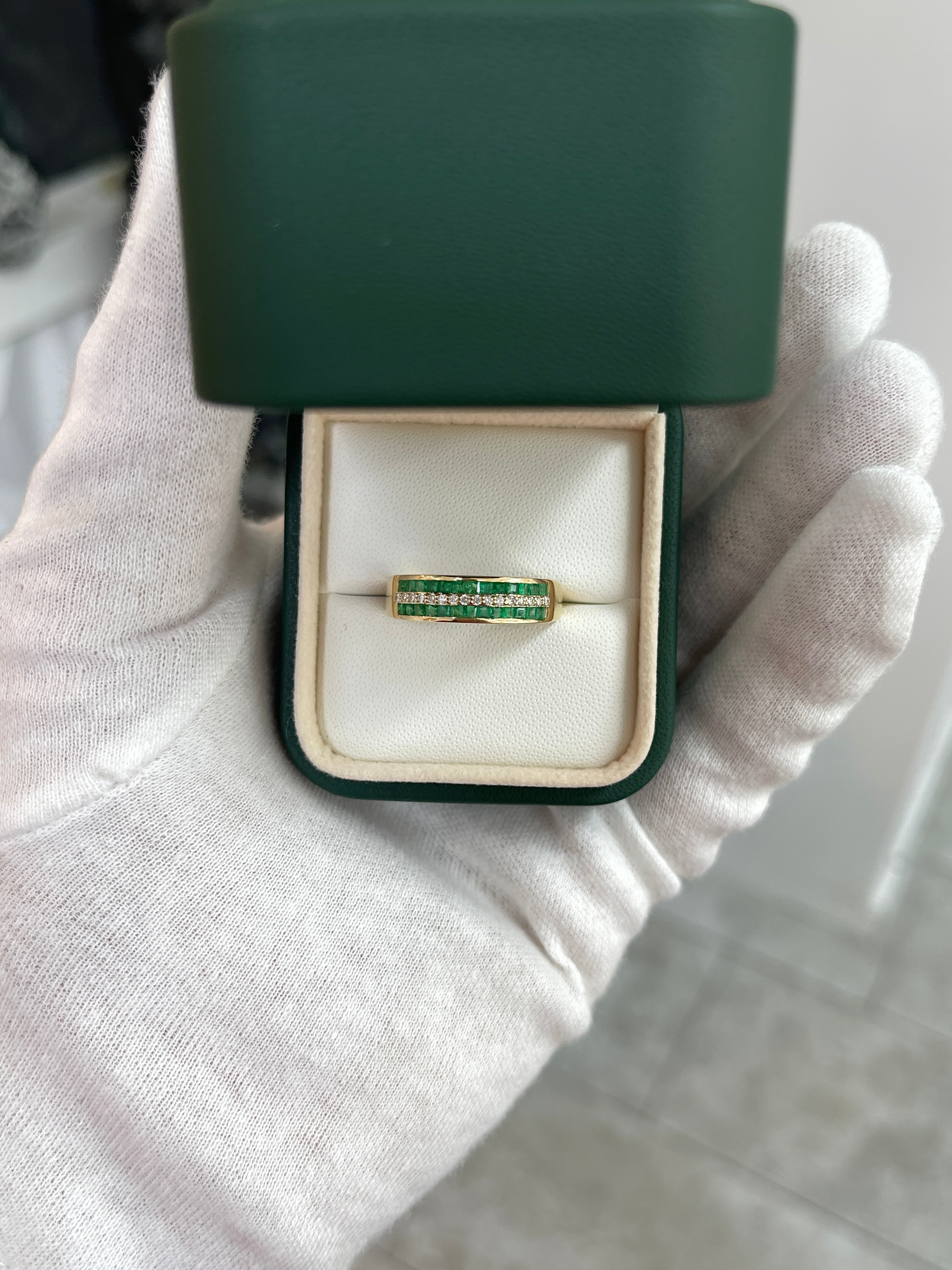 Three-row square emerald and diamond wedding band in 14K gold by JR Colombian Emeralds, featuring intricate gemstone detailing.