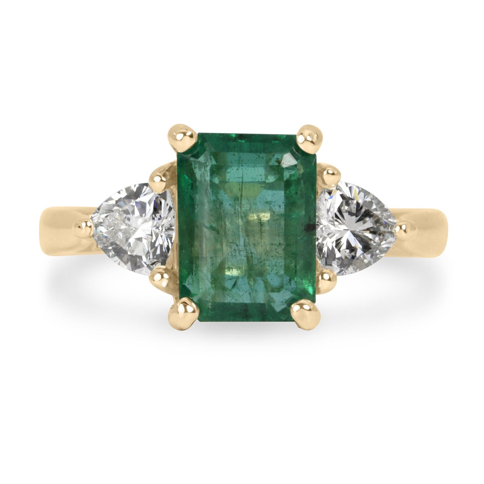 Three stone ring featuring 3.15 tcw natural emerald and lab diamond trillion cuts in 14K gold by JR Colombian Emeralds.