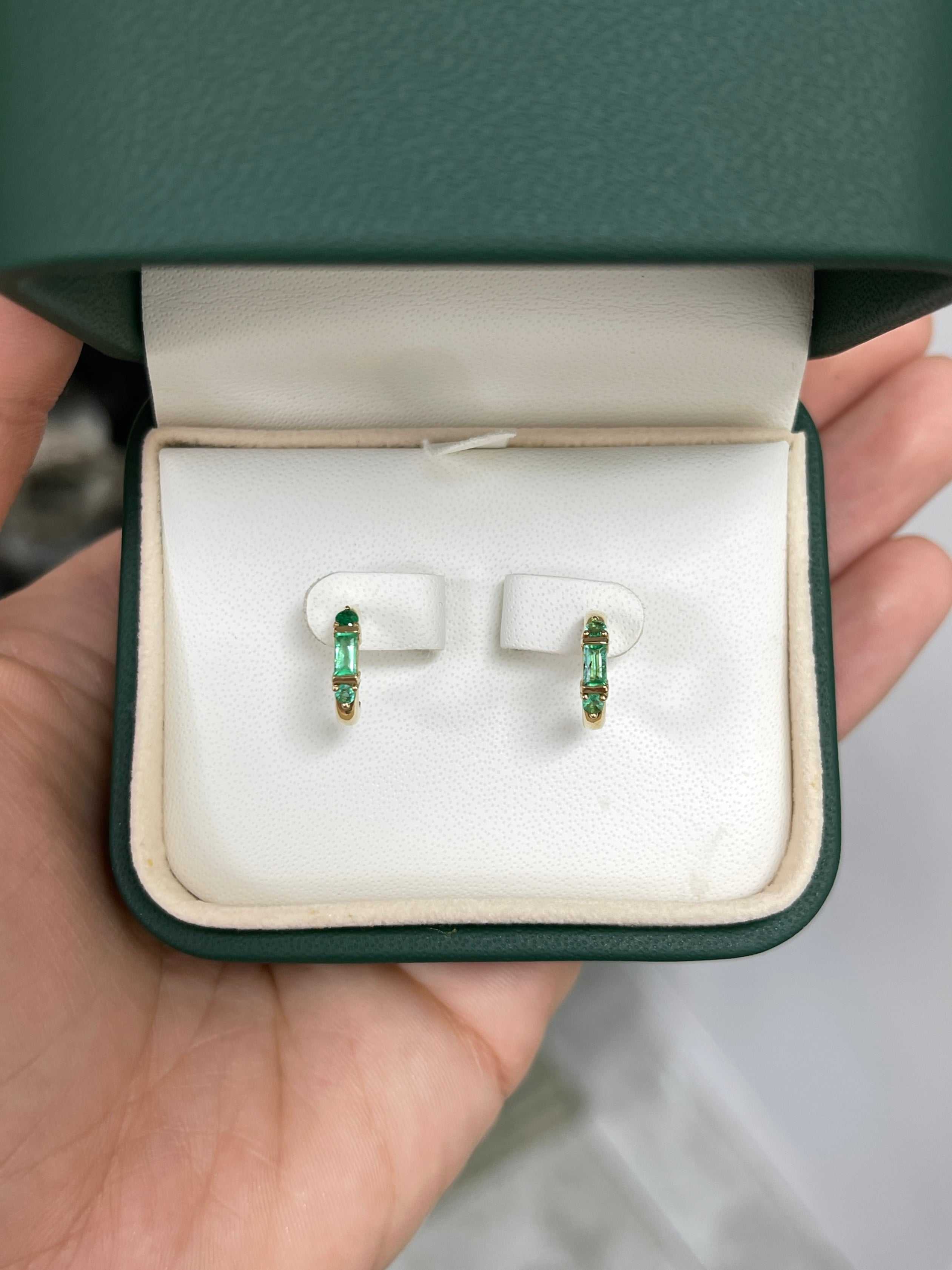 Petite 0.50tcw natural emerald half hoop earrings in 14K gold by JR Colombian Emeralds, featuring vibrant green gemstones.
