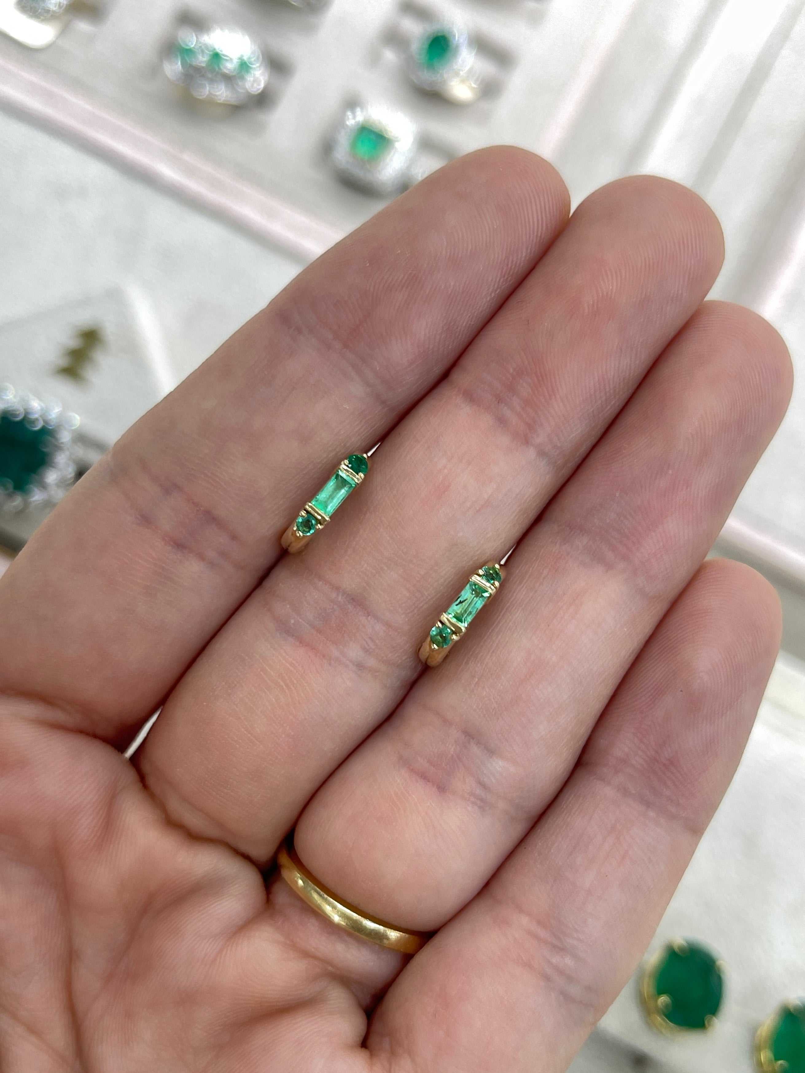 Petite 0.50ctw natural emerald half hoop earrings in 14K gold by JR Colombian Emeralds, showcasing elegant green gemstones.