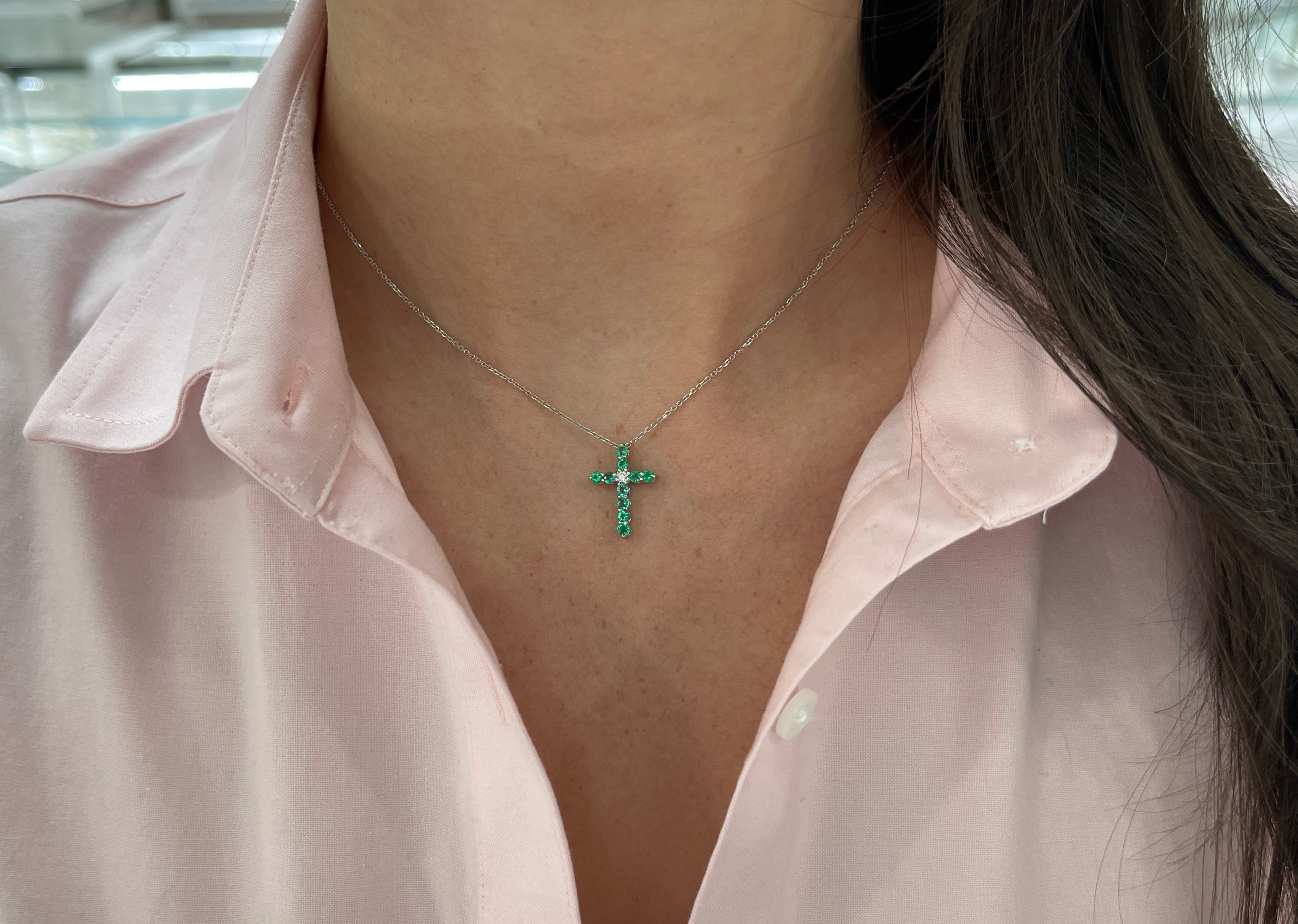 14K white gold cross necklace with 0.66tcw emerald and diamond accents, petite jewelry by JR Colombian Emeralds.
