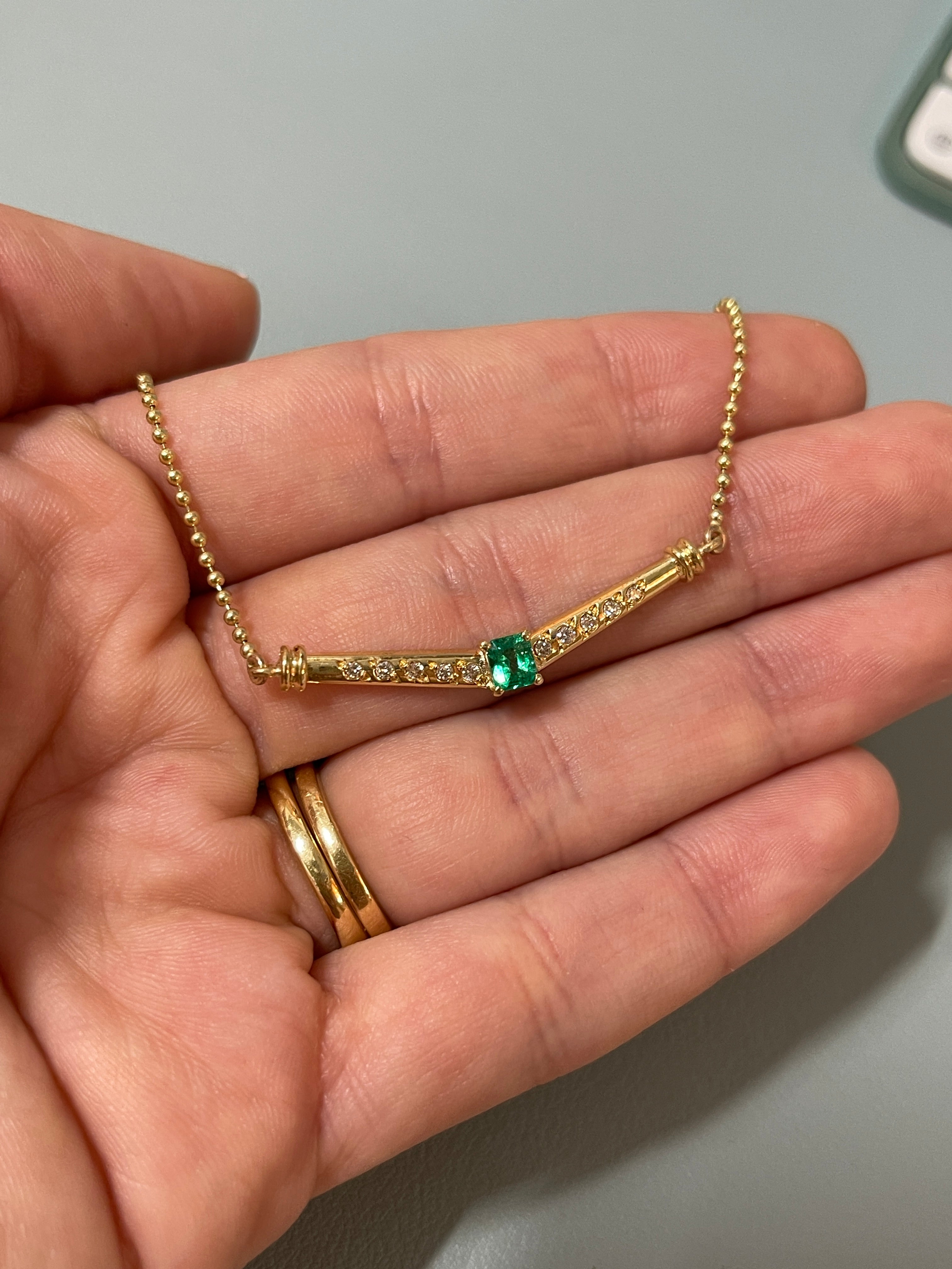 AAA+ Colombian Emerald and diamond bib beaded necklace in 14K-18K gold, featuring vibrant green emeralds and sparkling diamonds.