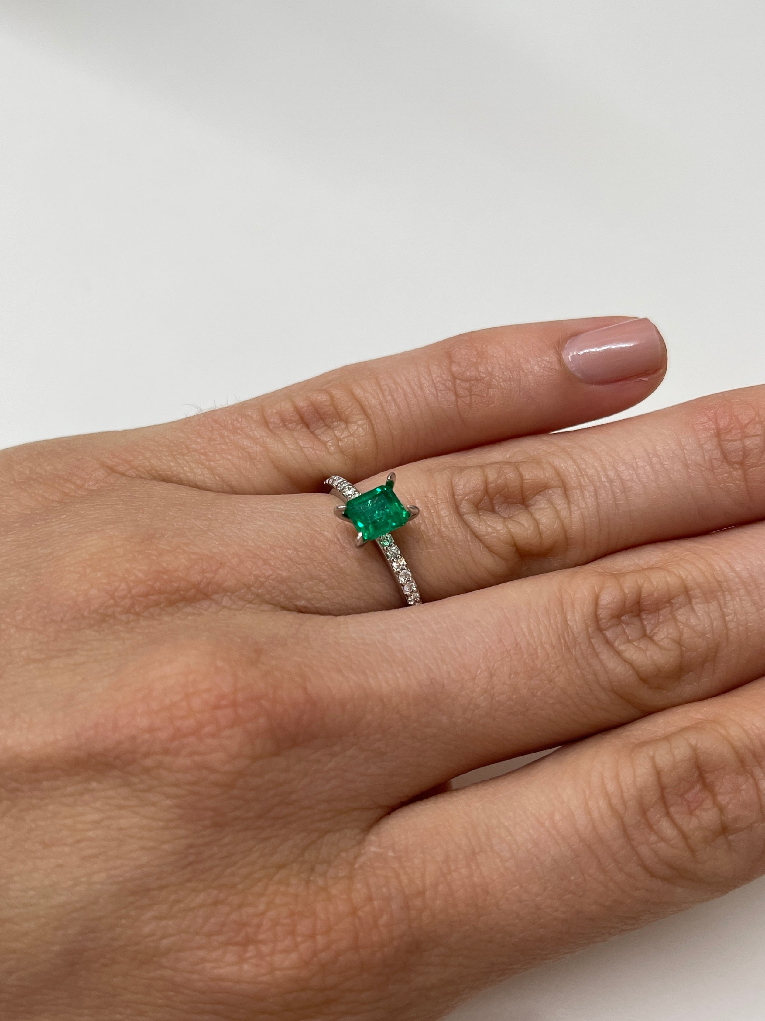 Loose 0.90 carat Colombian emerald in Asscher cut, AAA+ quality, vibrant green gemstone from JR Colombian Emeralds.