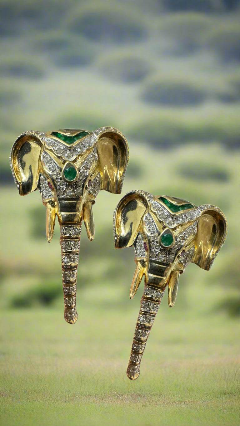 Elegant 14K gold elephant earrings with diamonds, rubies, emeralds, and moving trunks