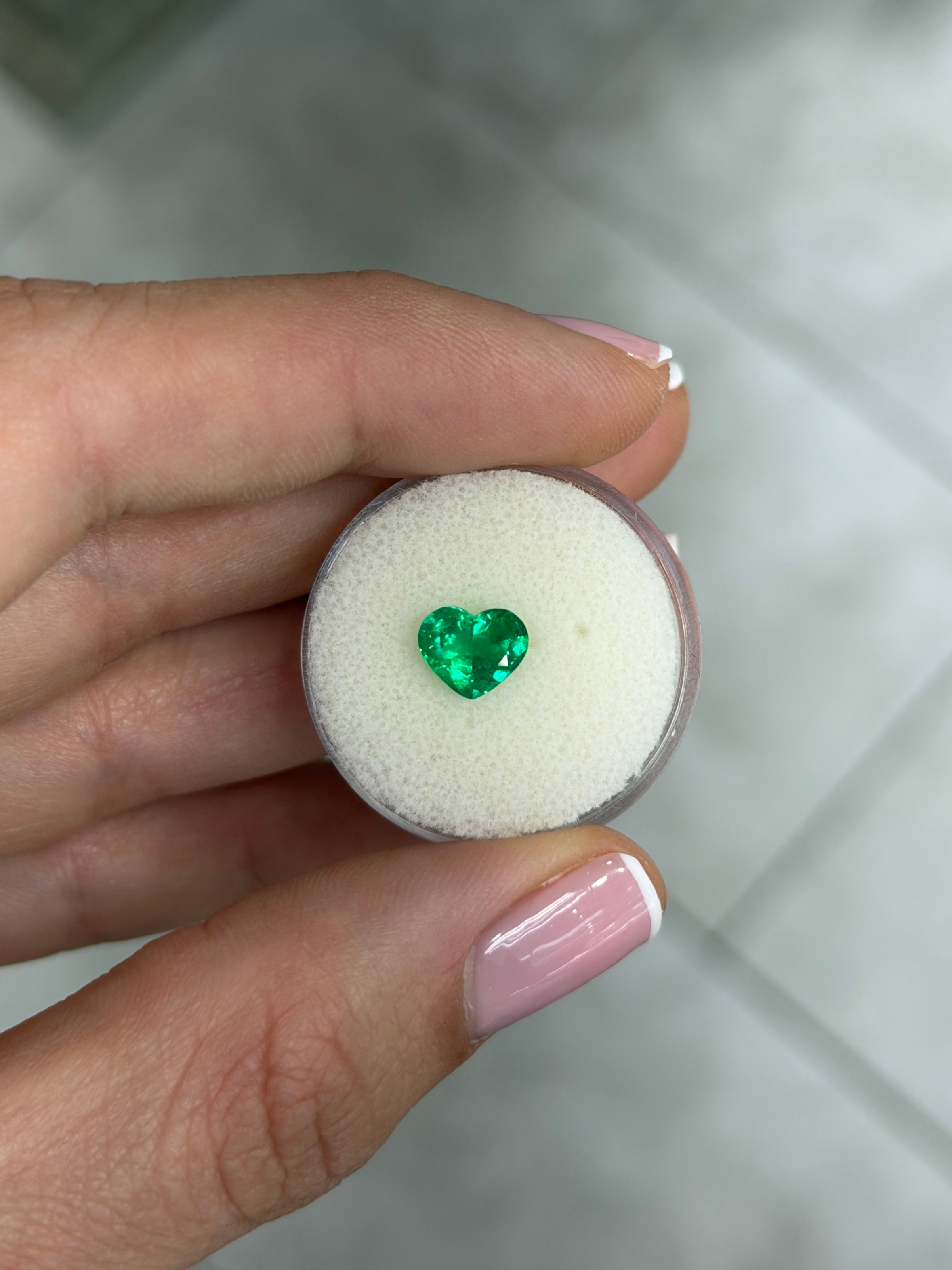 Natural 1.08 carat Colombian emerald in heart cut, AAA+ old mine Muzo green, loose gemstone from JR Colombian Emeralds.