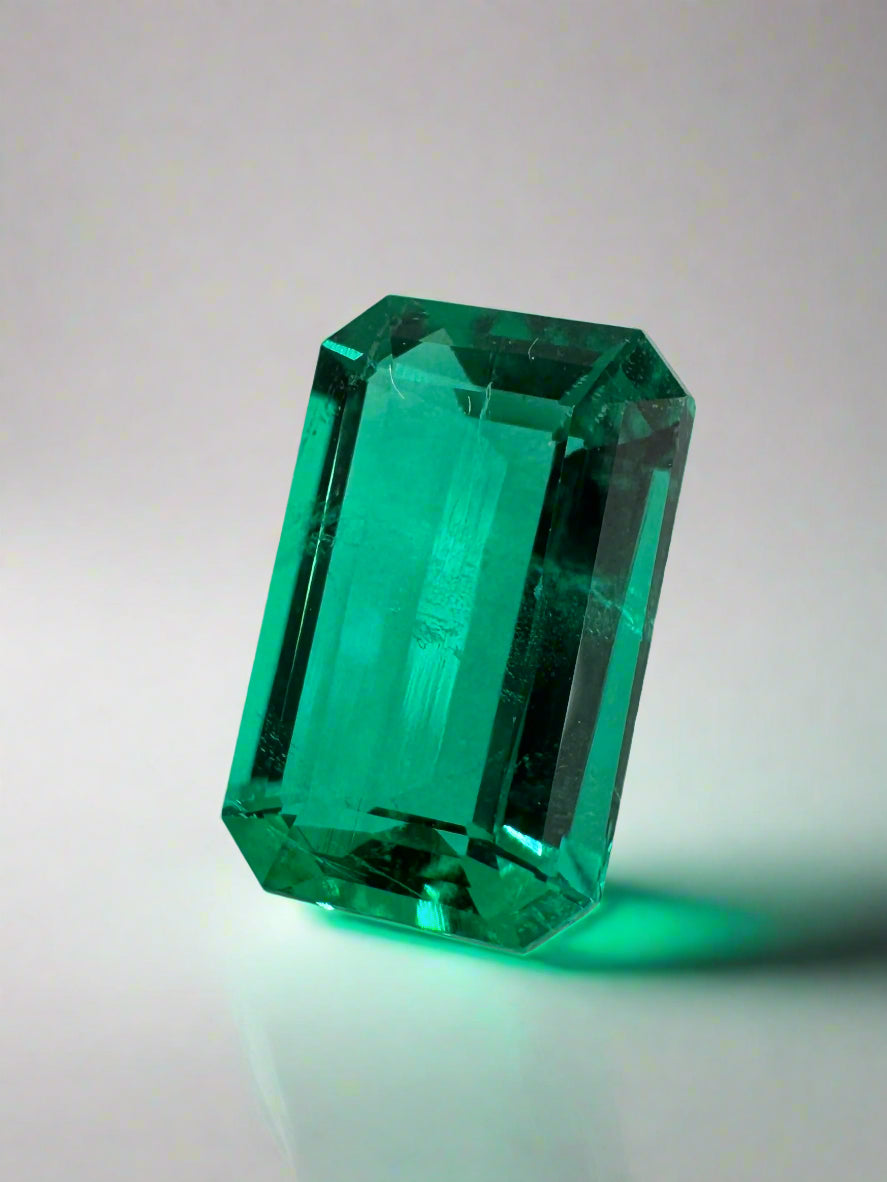 1.13 carat VVS clarity bluish green Colombian emerald in an emerald cut, showcasing its vibrant color and crystal-clear quality.