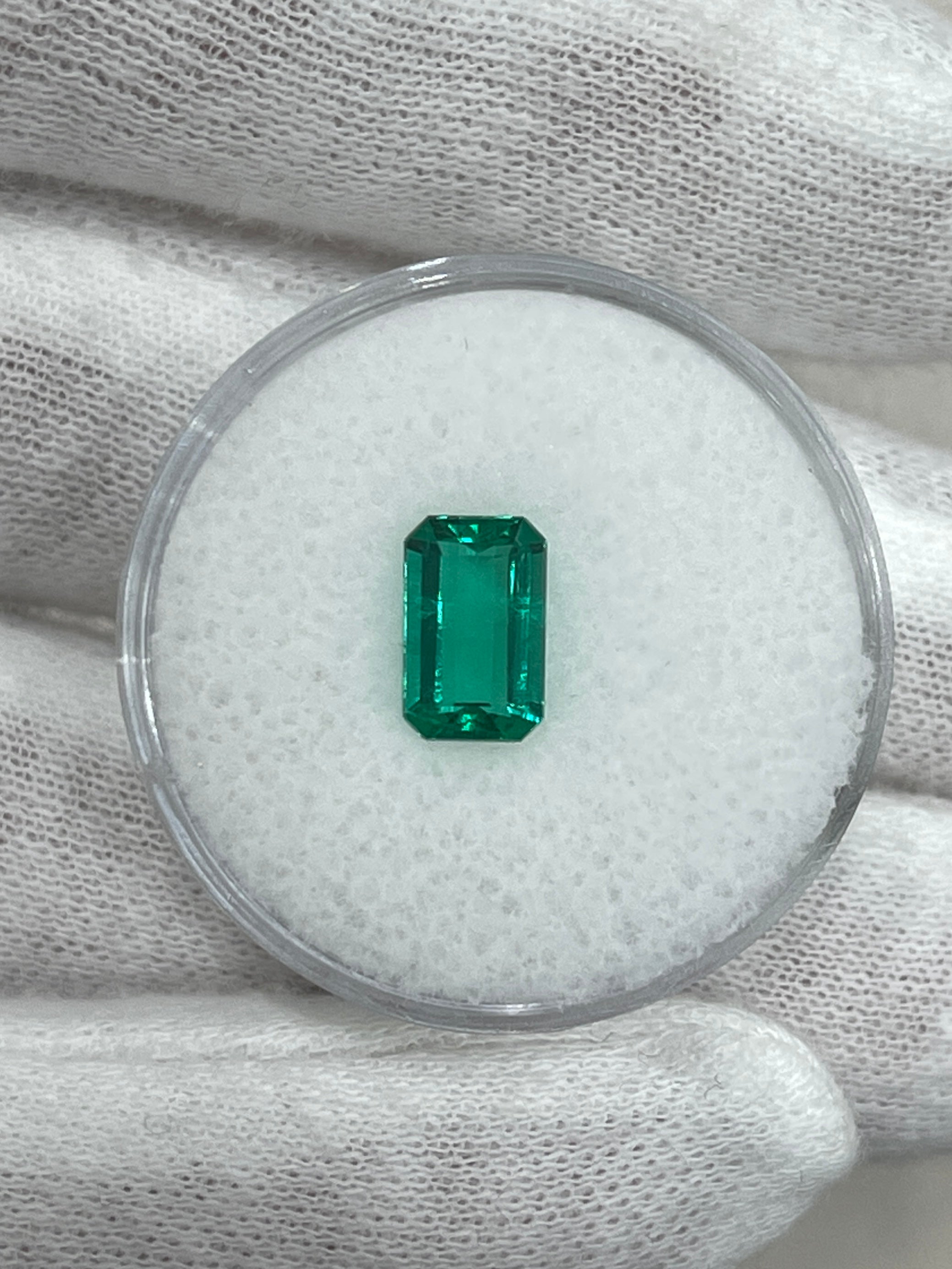 1.13 carat VVS bluish-green Colombian emerald cut gemstone from JR Colombian Emeralds, showcasing clarity and vibrant color.