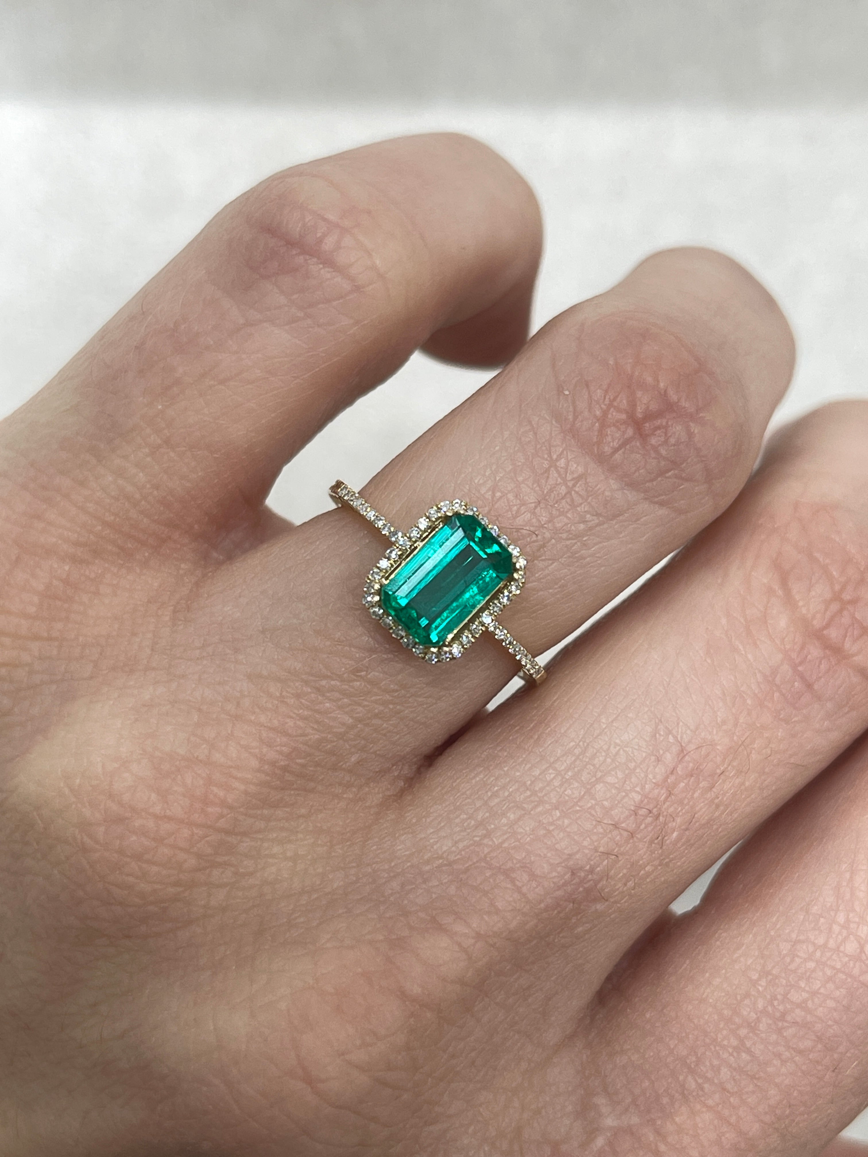 1.13 Carat VVS Colombian Emerald cut gemstone with bluish-green hue, crystal clear quality, by JR Colombian Emeralds.