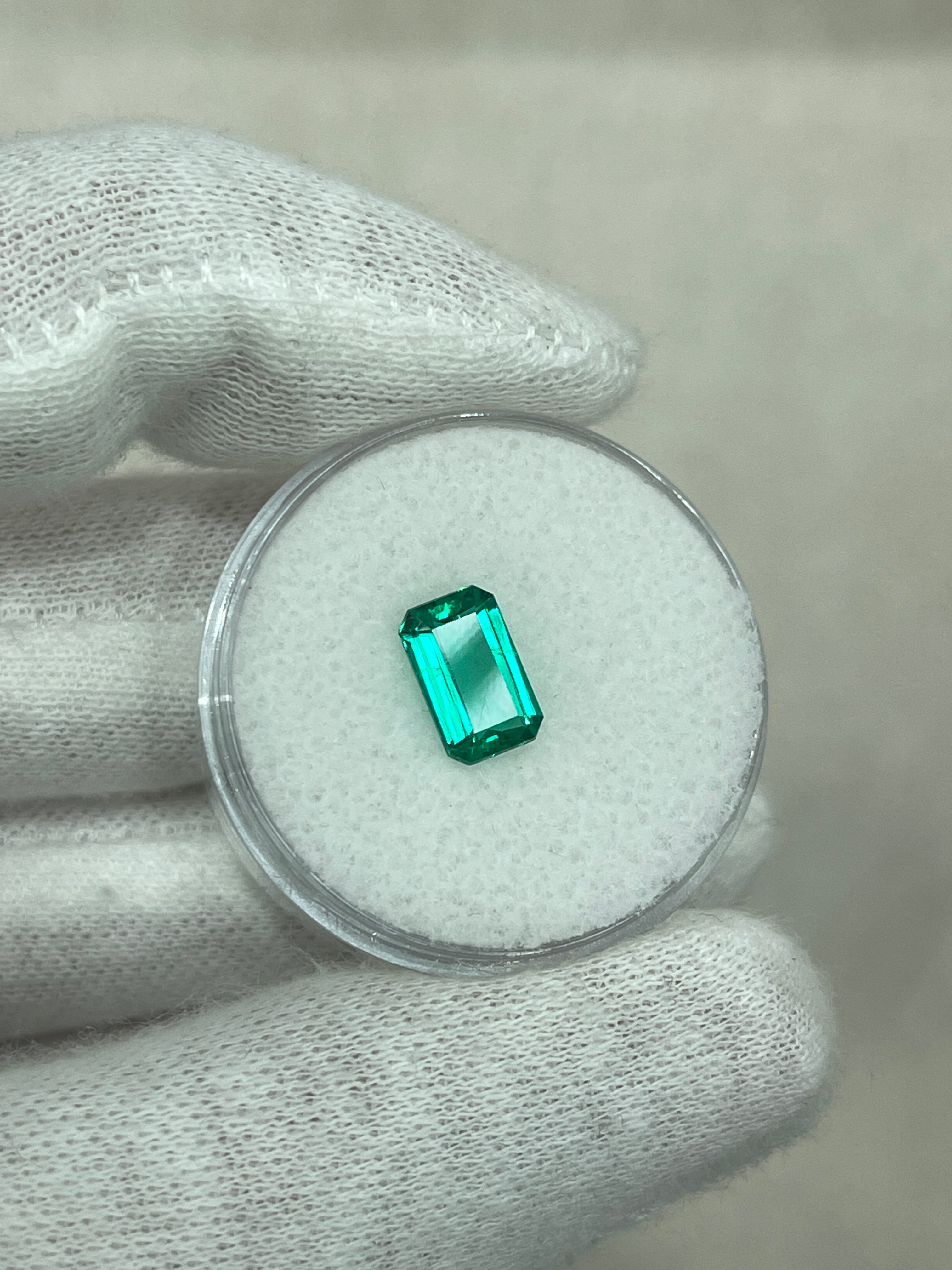 VVS 1.13 carat bluish green Colombian emerald cut gemstone with crystal-clear transparency, from JR Colombian Emeralds.