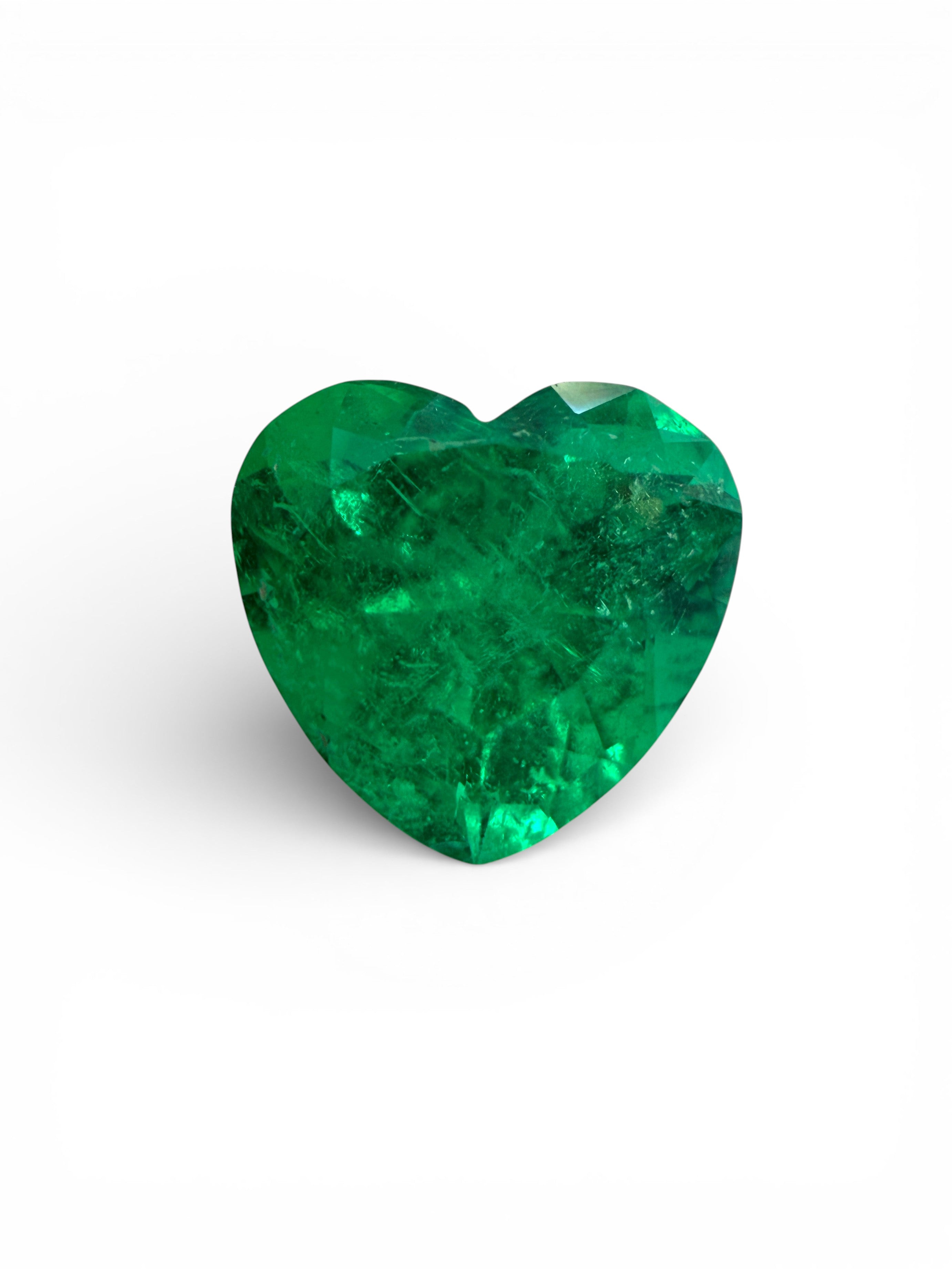1.22 carat AAA+ vivid Muzo green Colombian emerald heart cut loose gemstone from JR Colombian Emeralds.