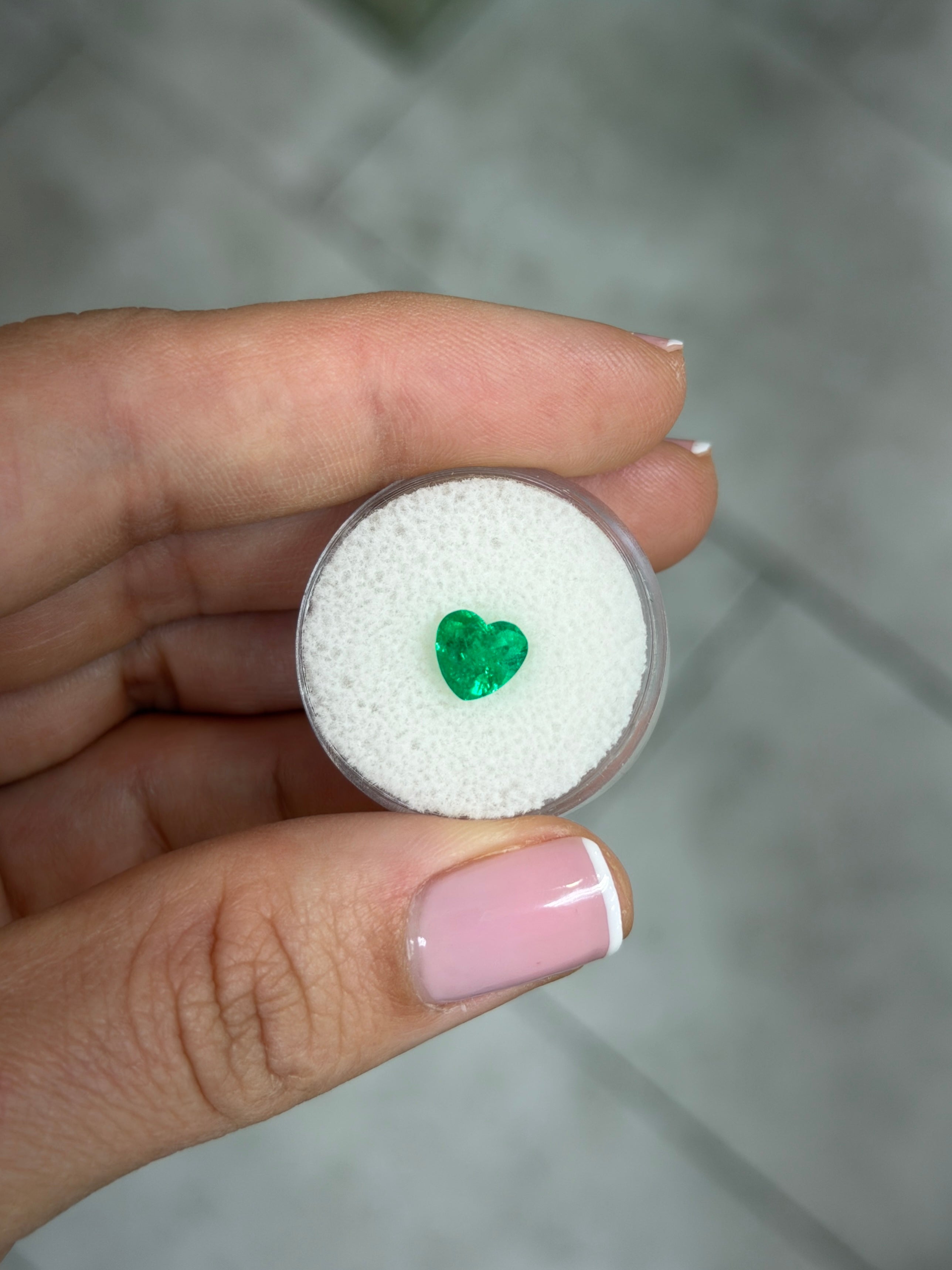 1.22 carat AAA+ vivid Muzo green Colombian emerald loose heart cut gemstone from JR Colombian Emeralds.