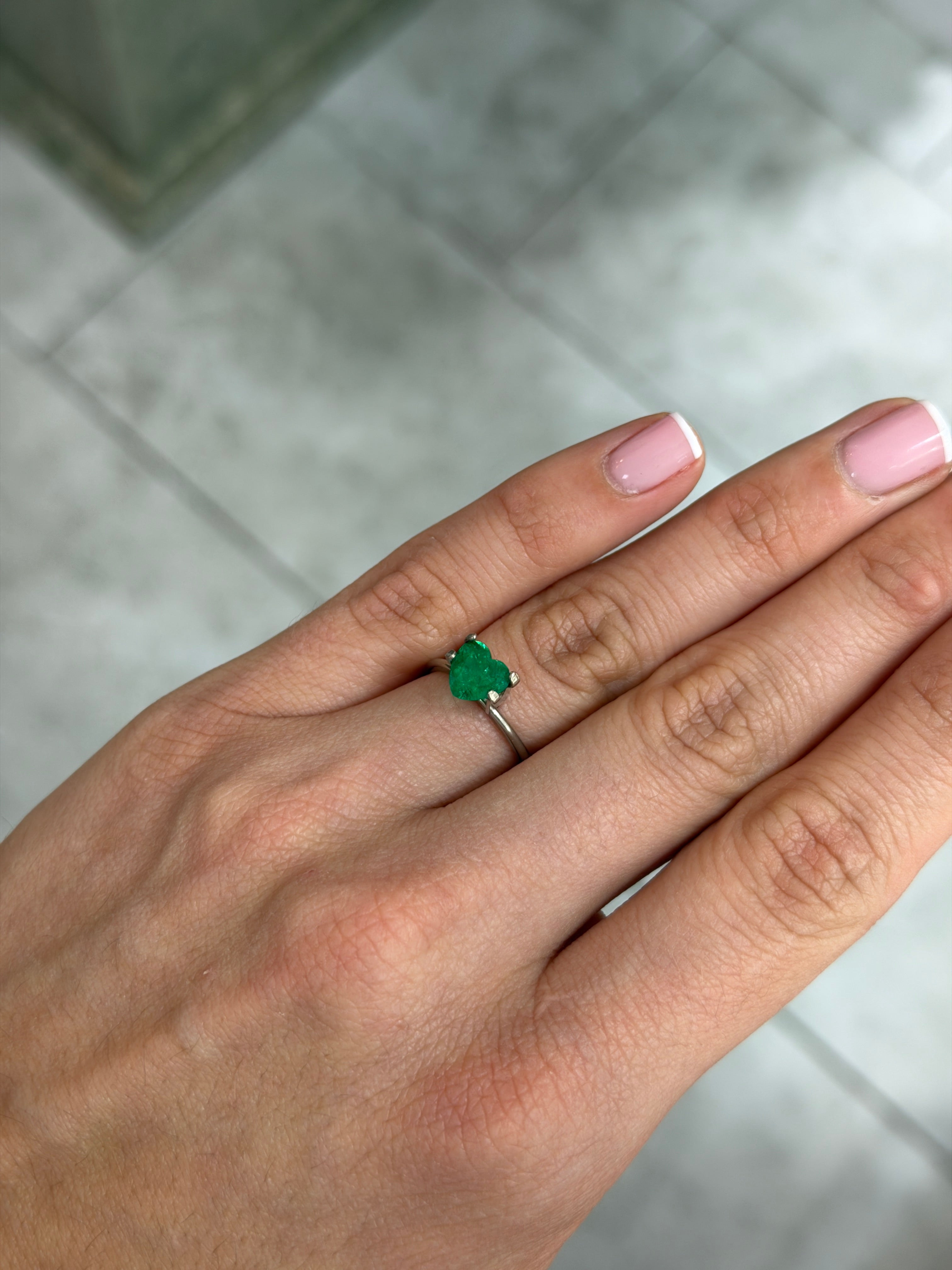 1.22 carat AAA+ vivid Muzo green Colombian emerald heart-shaped loose gemstone by JR Colombian Emeralds.