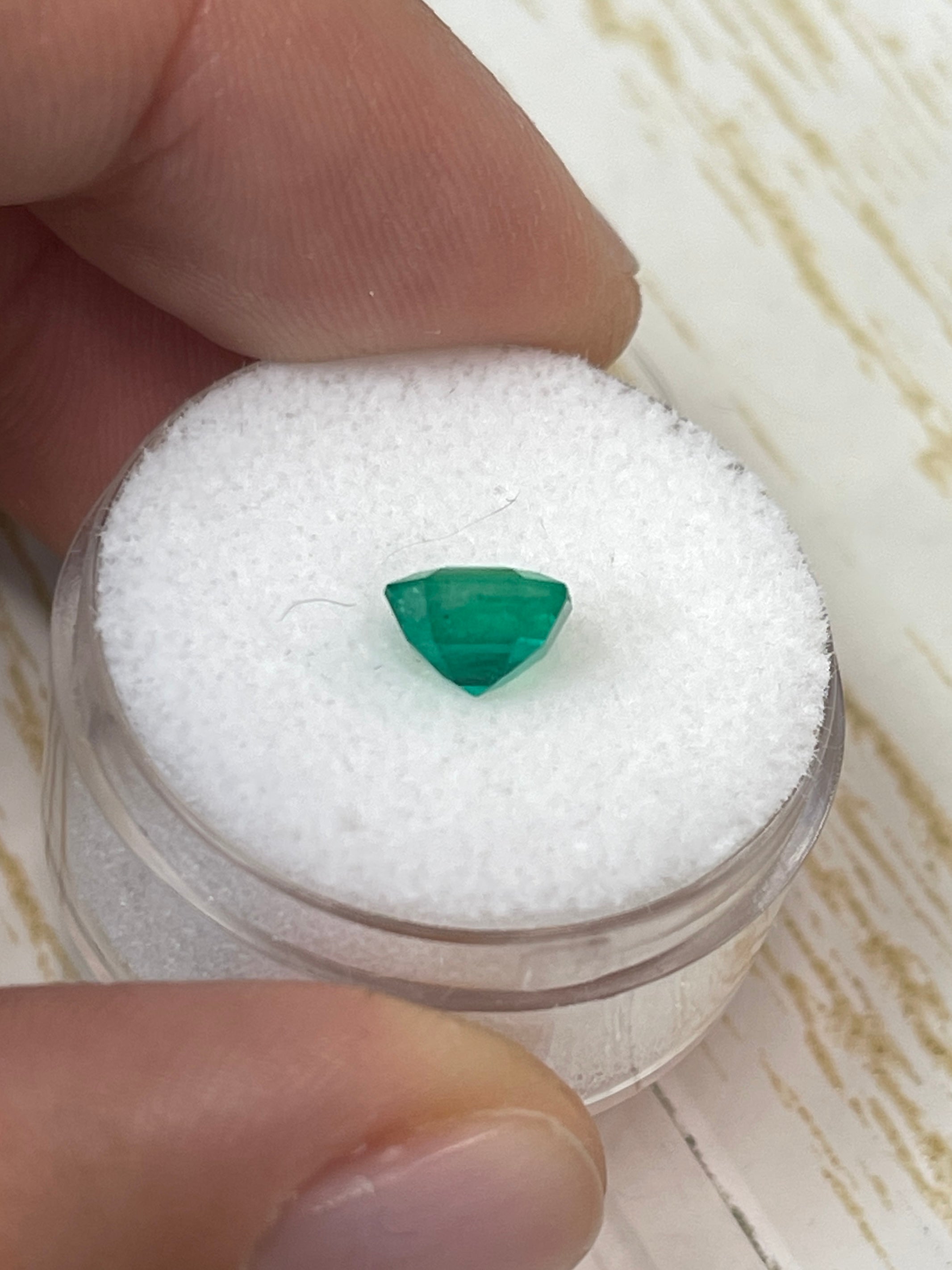 Uncut 1.24 carat bluish green Asscher cut Colombian emerald from JR Colombian Emeralds, natural and unset.