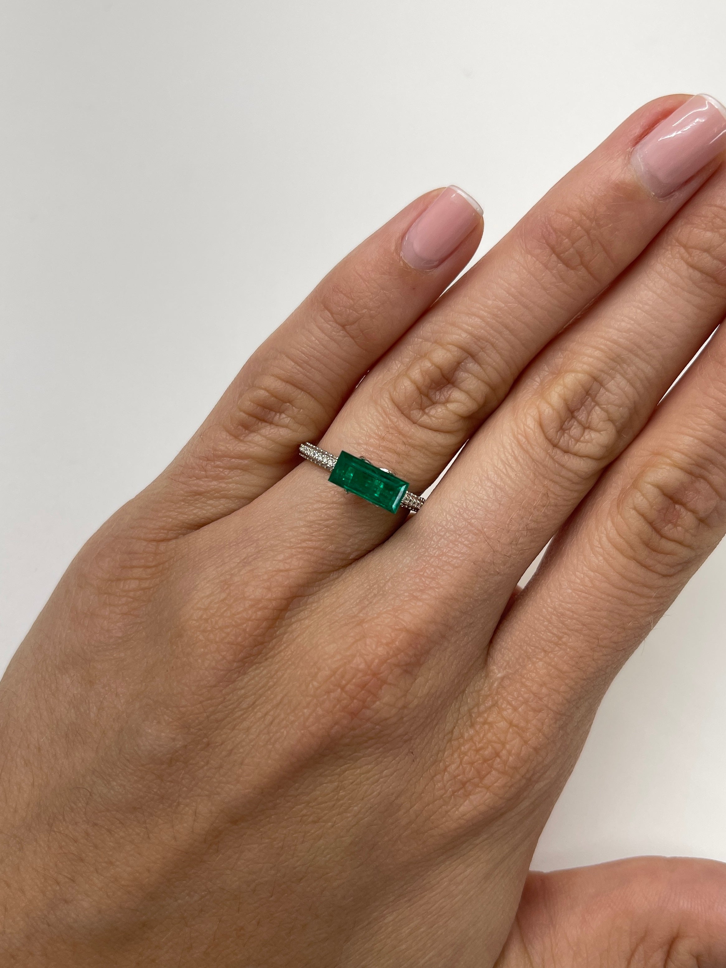 1.38 carat AAA+ Muzo Colombian emerald loose gemstone, 10x5mm baguette cut, natural and vibrant green from JR Colombian Emeralds