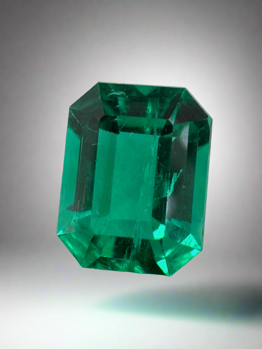 Vivid bluish green 1.49 carat Colombian emerald cut gemstone from JR Colombian Emeralds, showcasing a classic rectangular shape.