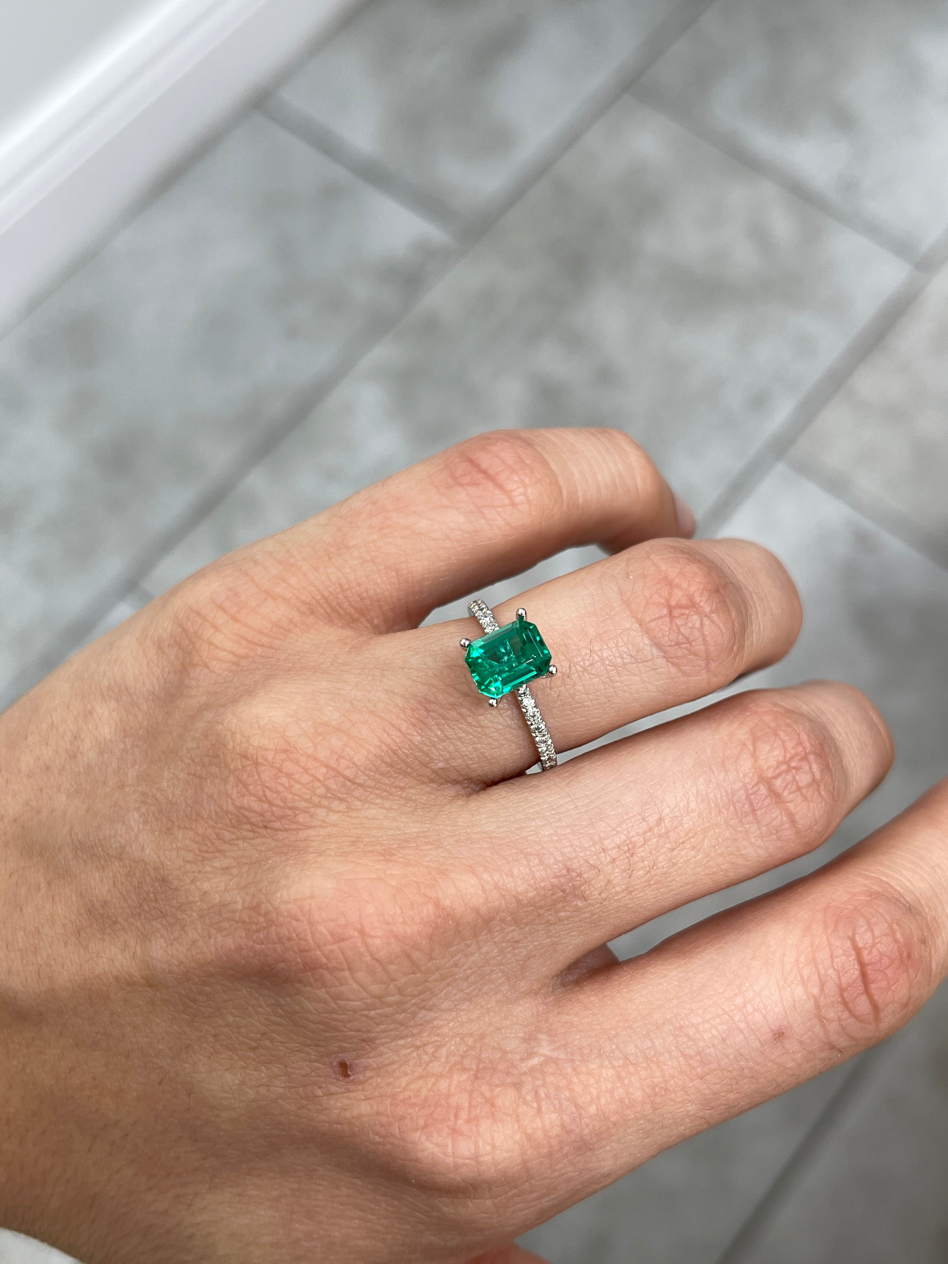 Vivid bluish green 1.49 carat Colombian emerald cut by JR Colombian Emeralds, showcasing its clarity and rich color.