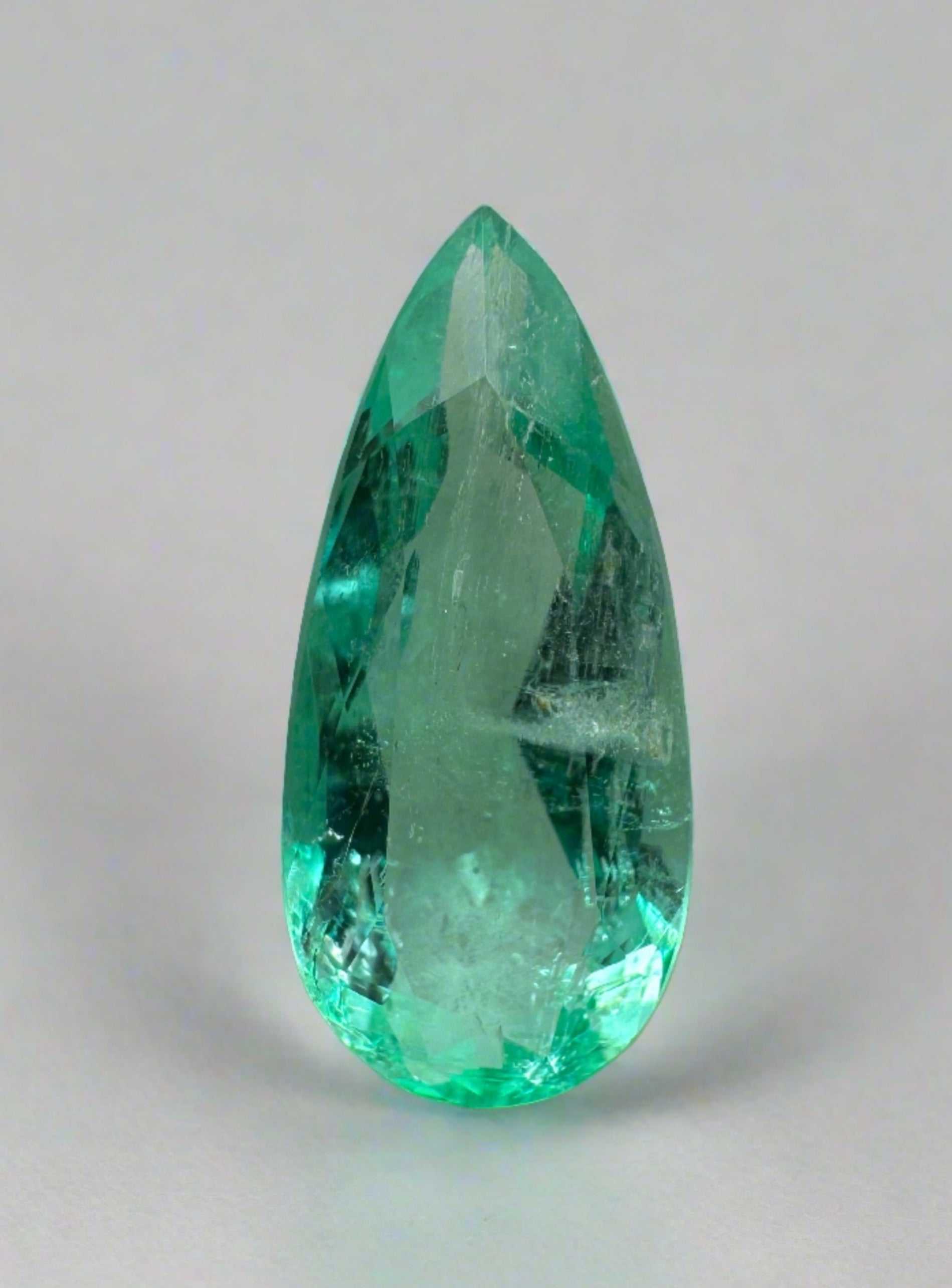 1.49 carat slender green natural Colombian emerald loose pear cut gemstone from JR Colombian Emeralds.