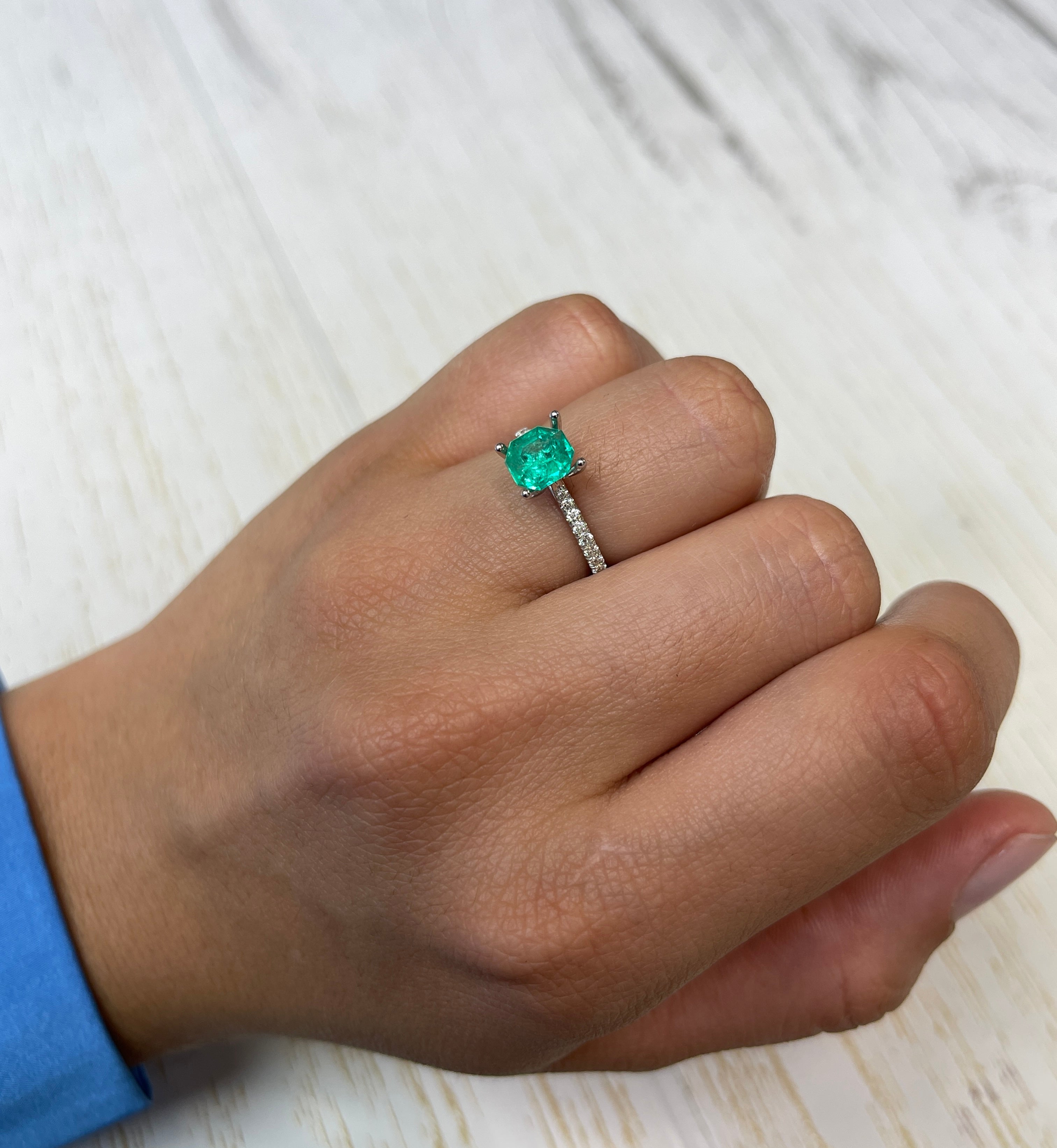 Bluish green 1.50 carat octagon cut Colombian emerald by JR Colombian Emeralds, natural and unset gemstone with vibrant color.