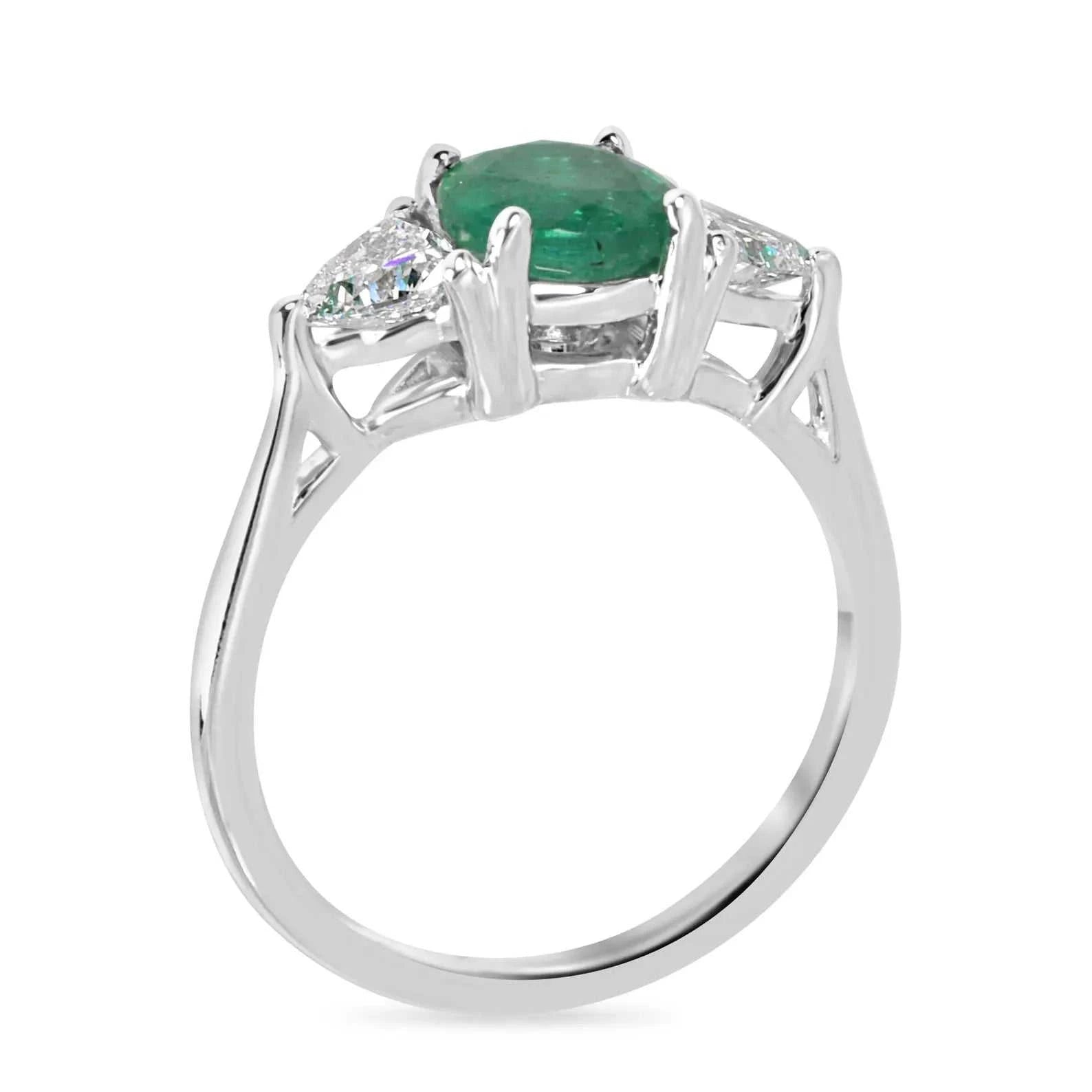 Natural round emerald and trillion lab diamond three-stone ring in 14K gold by JR Colombian Emeralds, showcasing sparkling gemstones.
