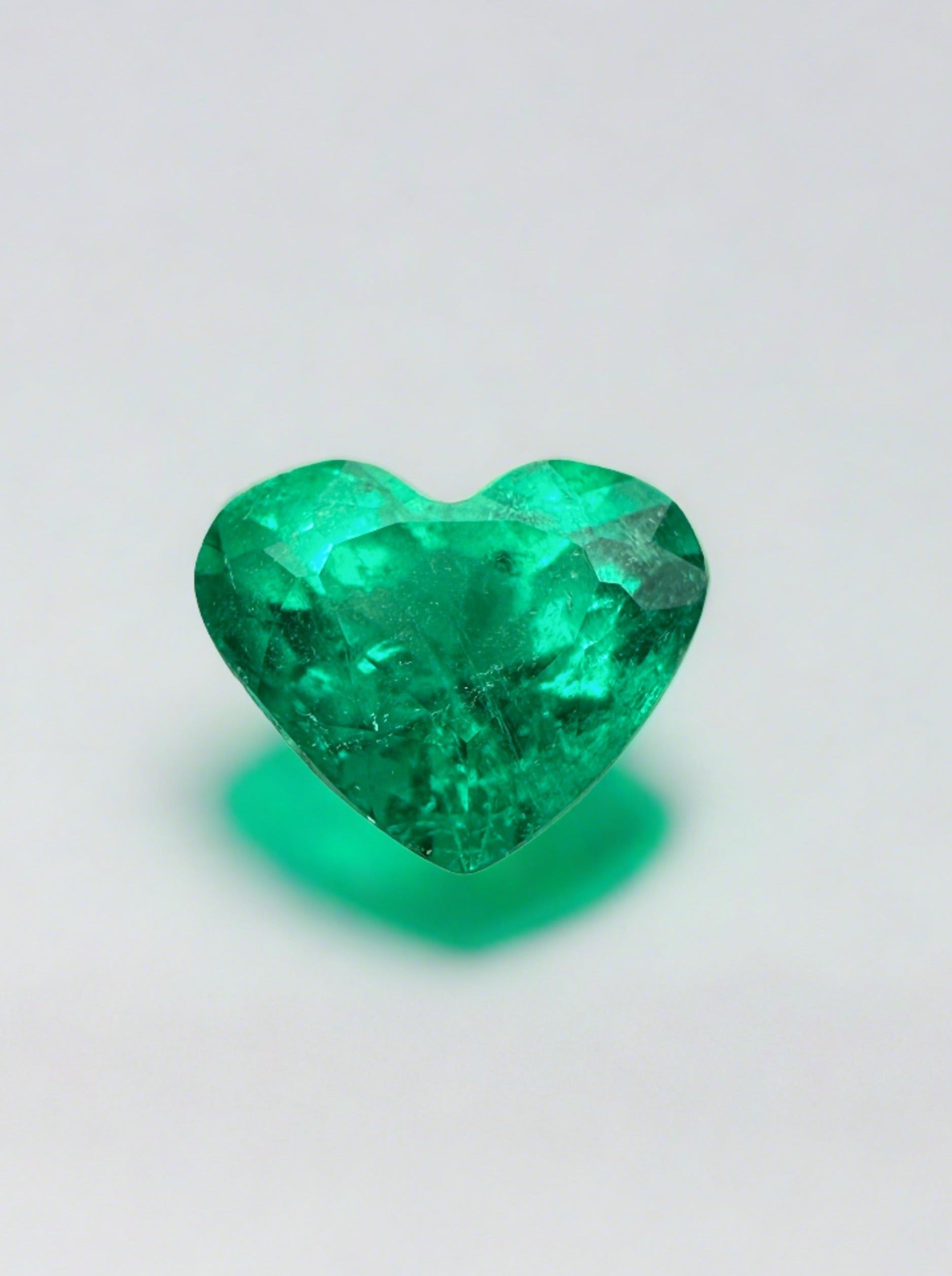 1.62 carat VS clarity green natural Colombian emerald loose heart-cut gemstone by JR Colombian Emeralds.