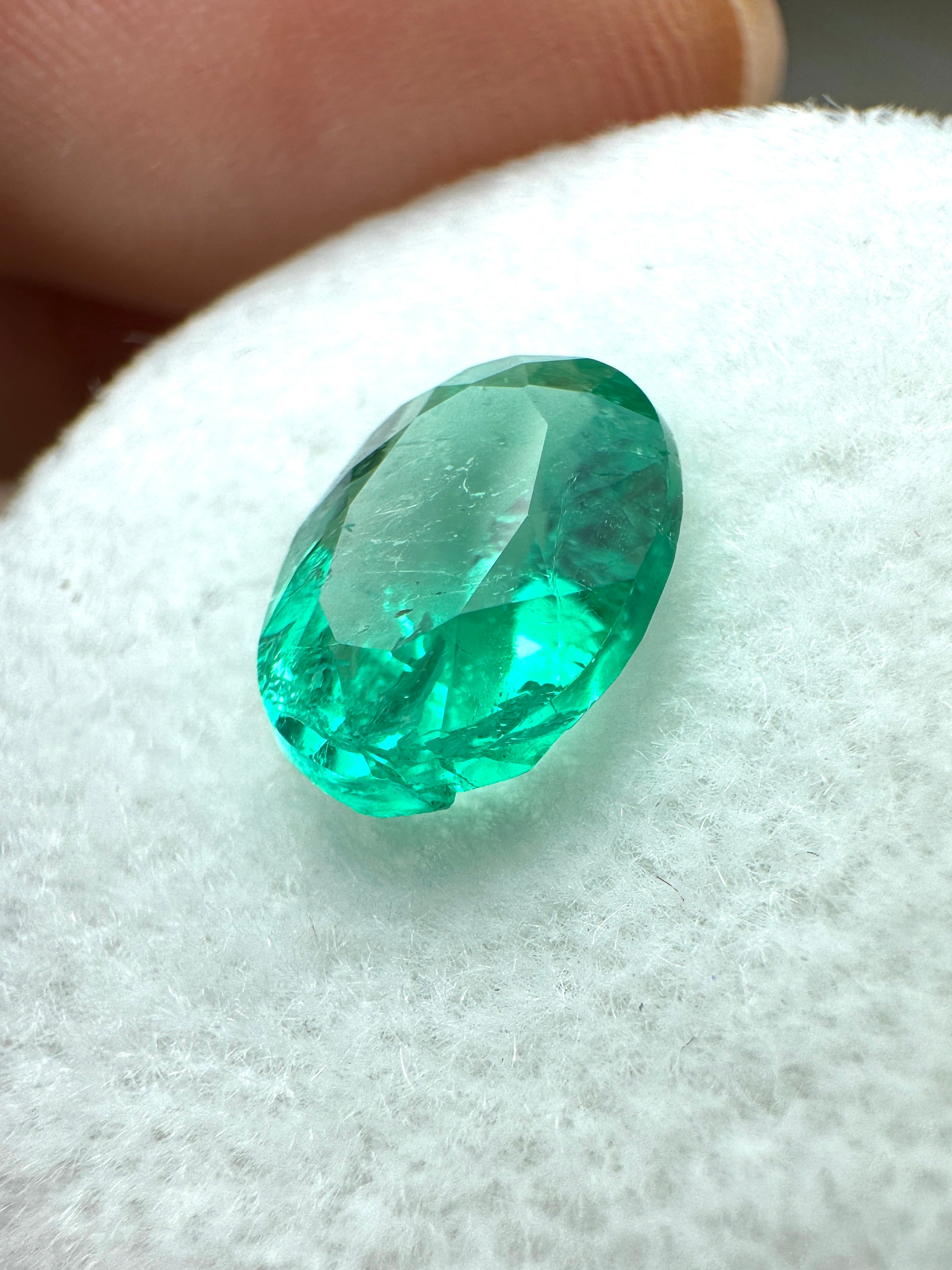 Oval cut 1.64 carat green natural Colombian emerald gemstone from JR Colombian Emeralds.