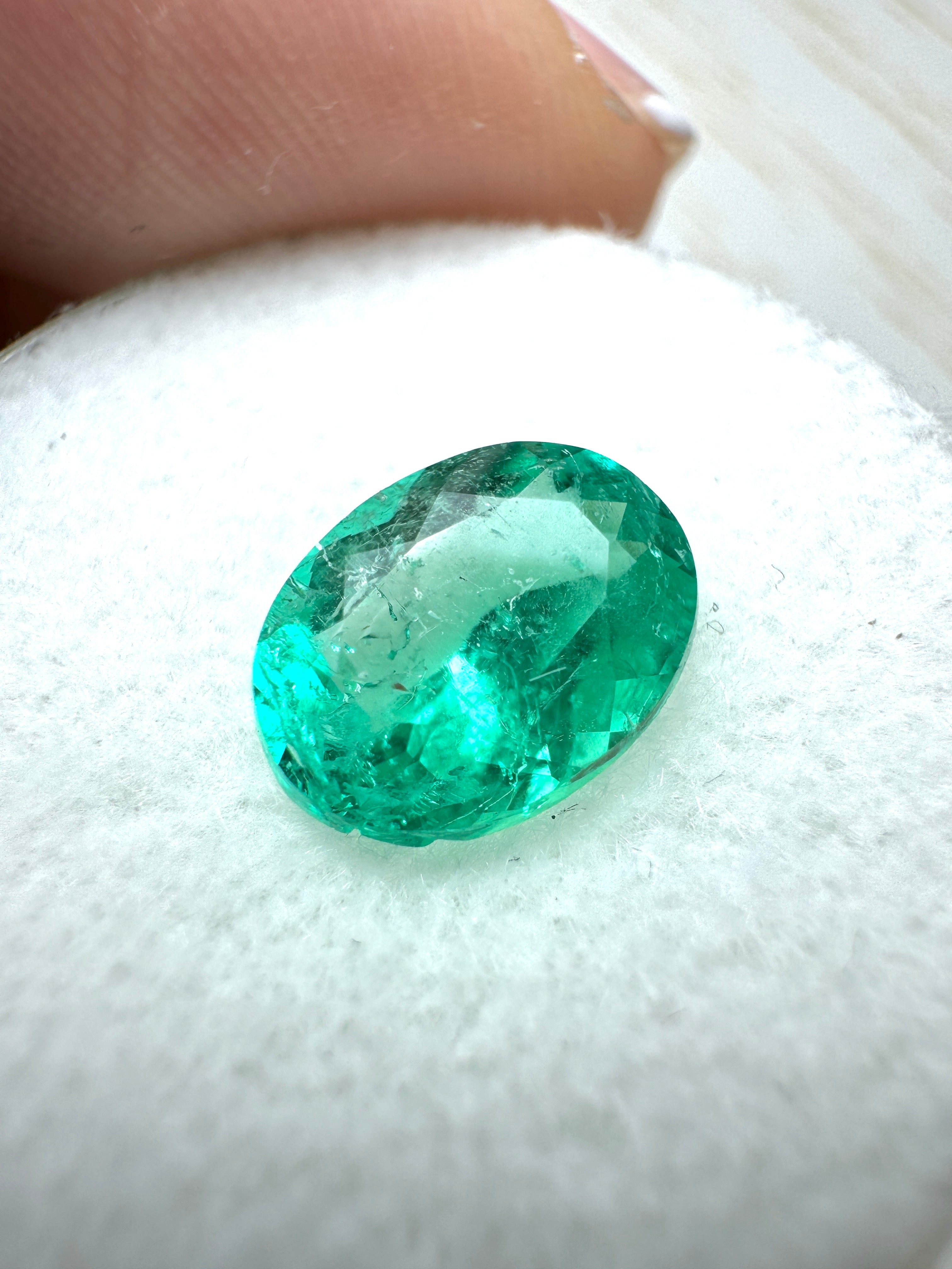 Loose 1.64 carat green Colombian emerald in oval cut, natural gemstone from JR Colombian Emeralds.