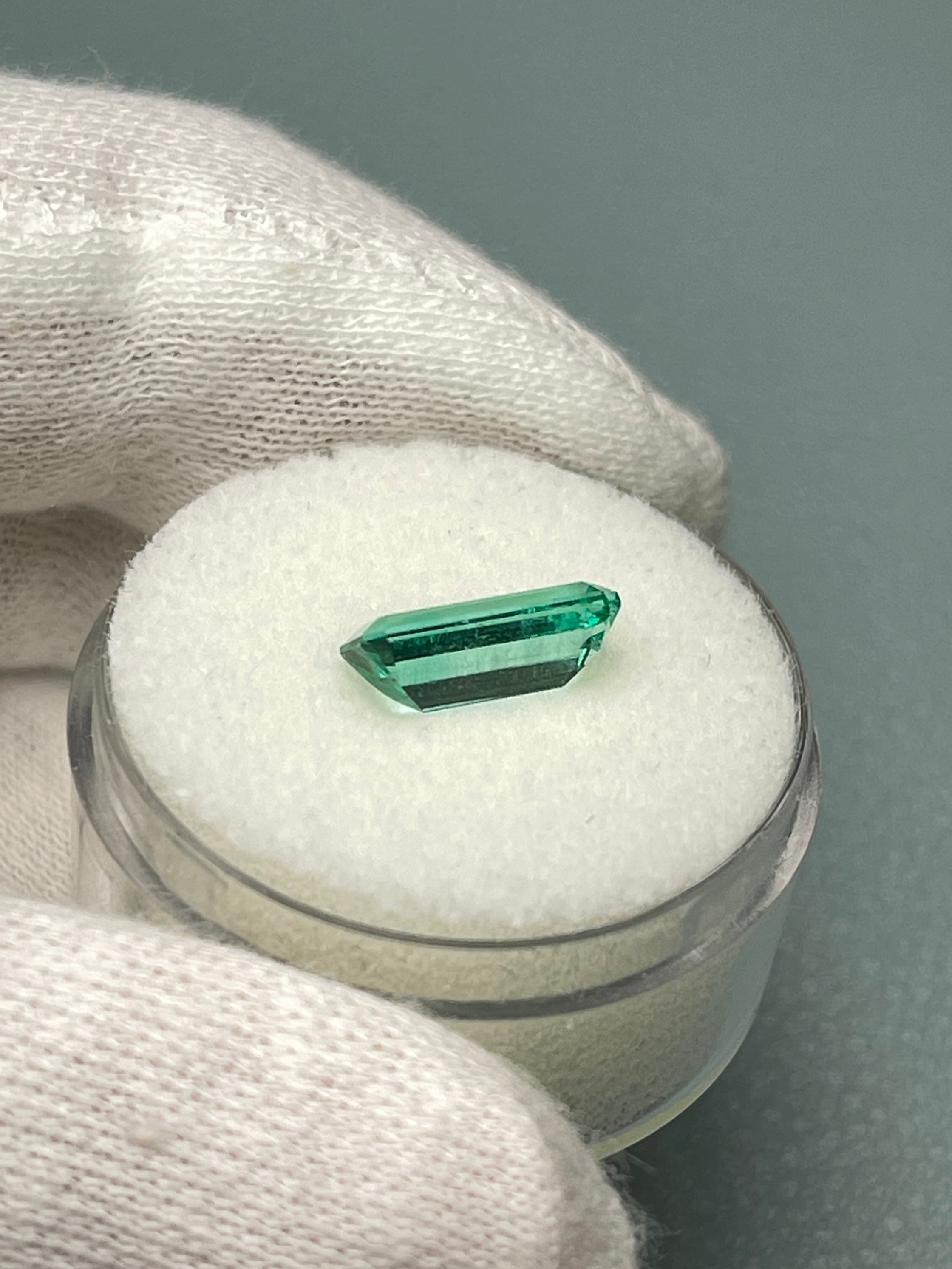 Loose 1.65 carat Colombian emerald with elongated cut, crystalline clarity, natural green color, from JR Colombian Emeralds.