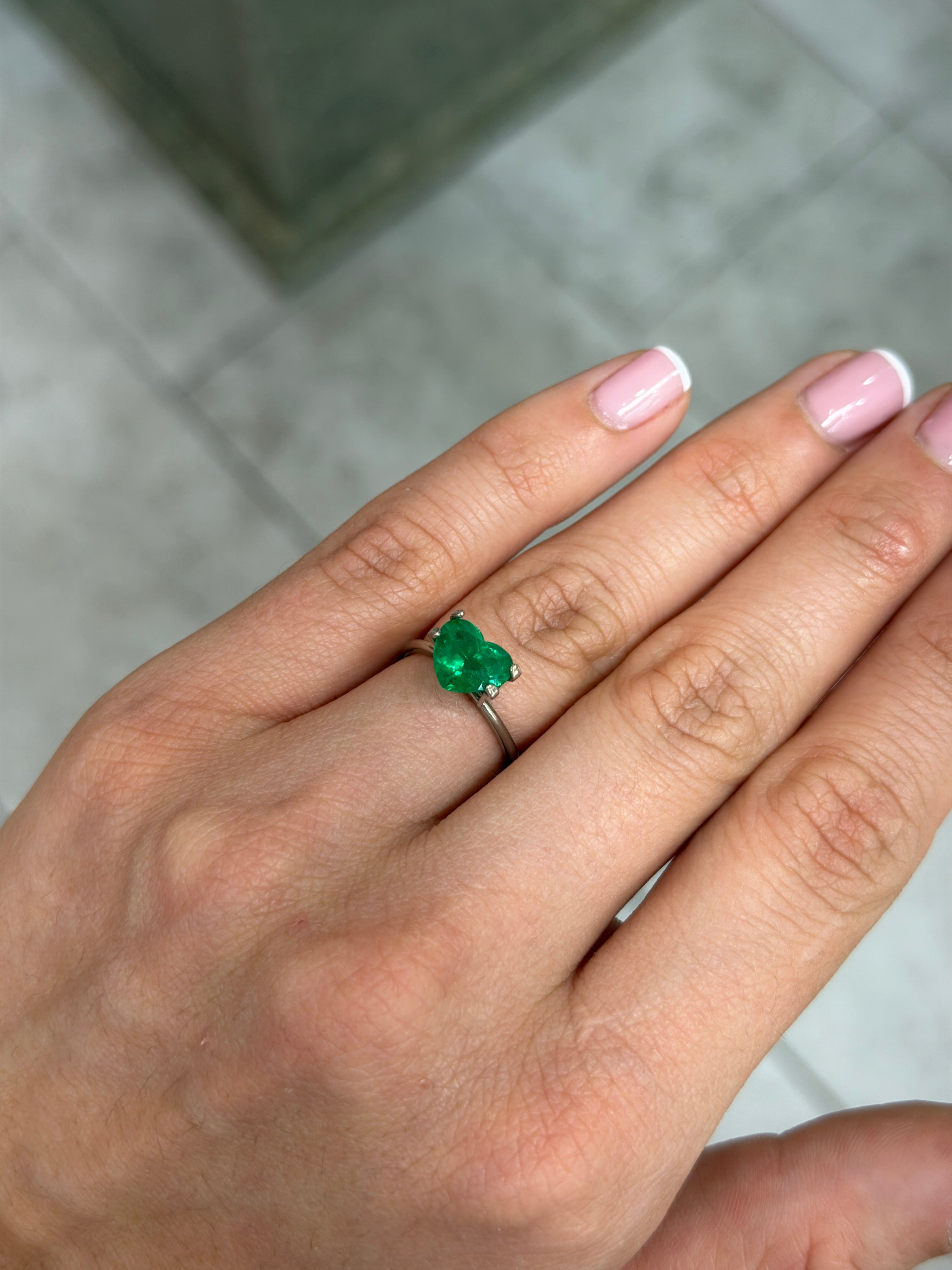 1.65 carat AAA+ vivid intense Muzo green Colombian emerald loose heart cut gemstone by JR Colombian Emeralds.