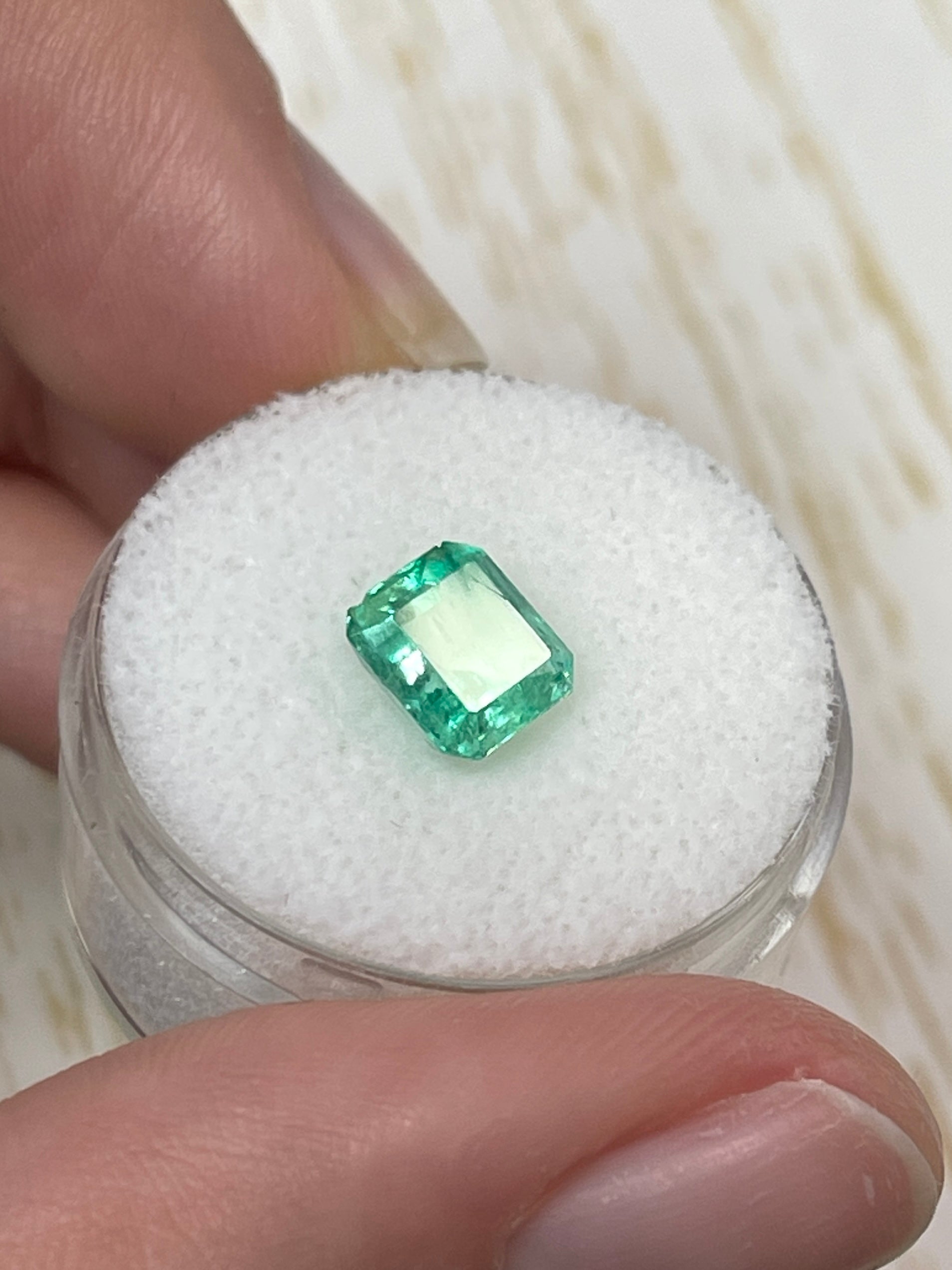 1.78 carat Chipped limish green Colombian emerald, 7.5x7 Asscher cut, natural unset gemstone from JR Colombian Emeralds.