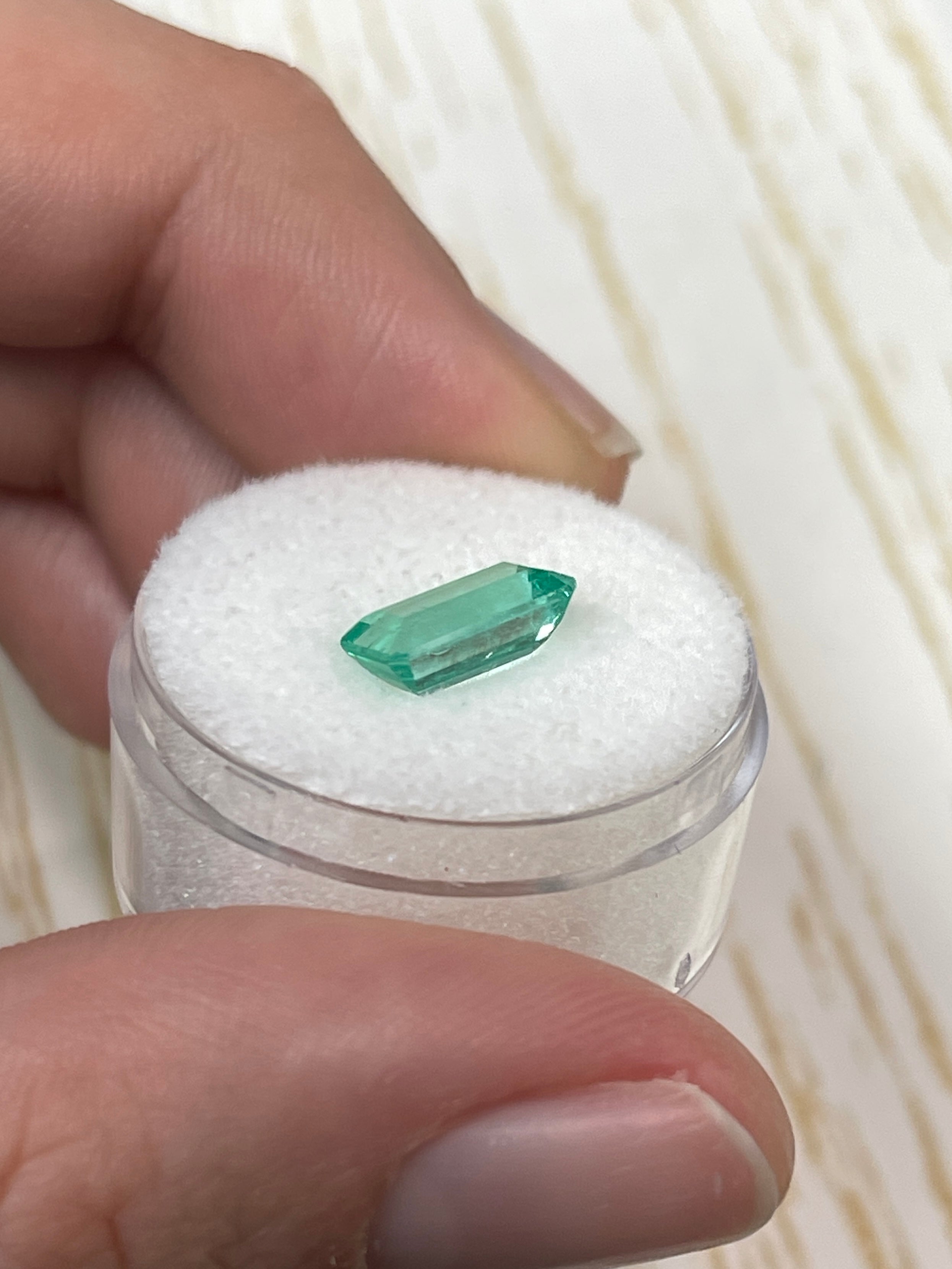 1.80 Carat VVS Colombian emerald loose stone, 10x6mm emerald cut, slender bluish green gemstone from JR Colombian Emeralds.