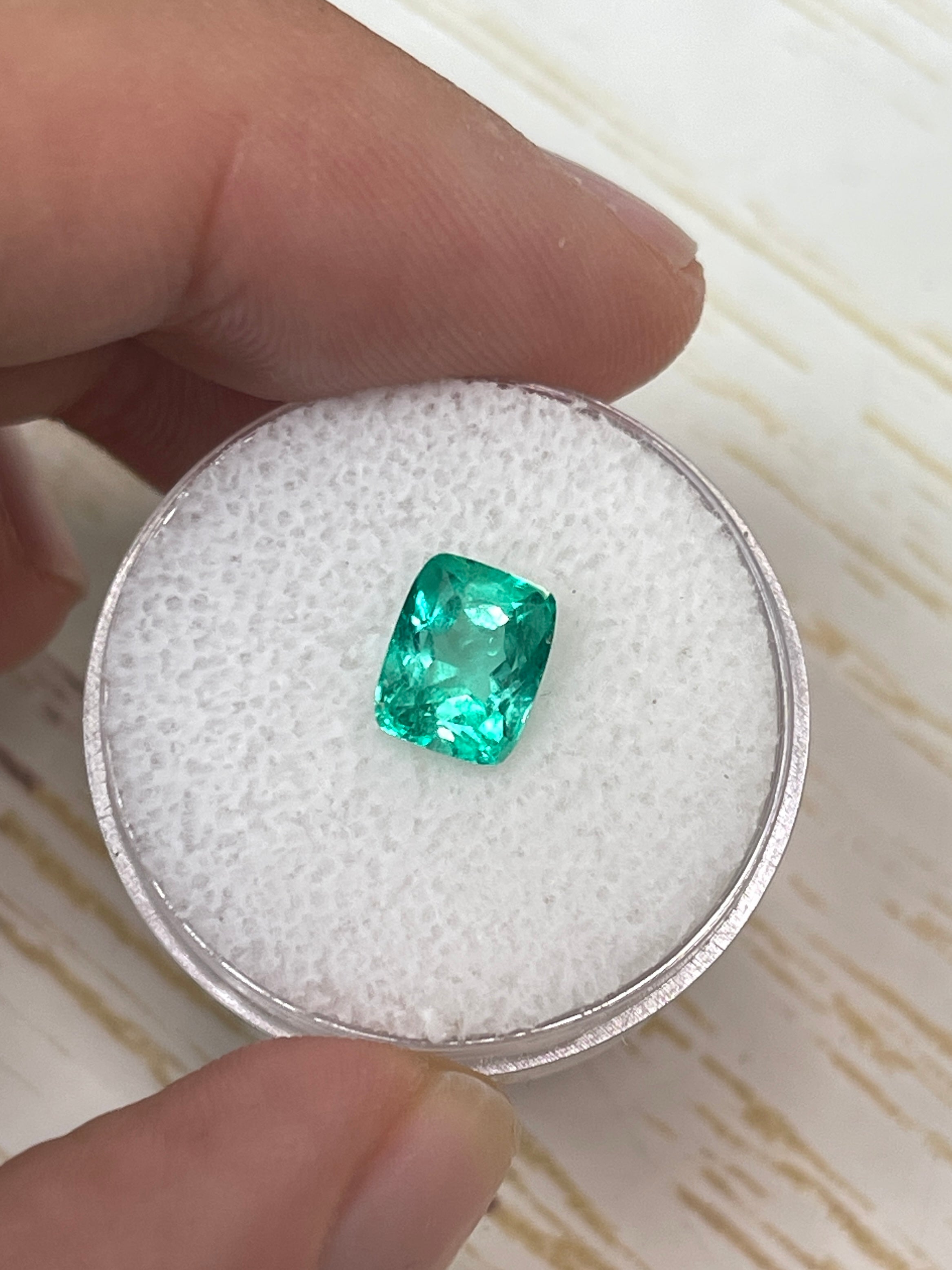 Loose 1.81 carat green Colombian emerald, elongated cushion cut, VVS clarity, natural gemstone from JR Colombian Emeralds.