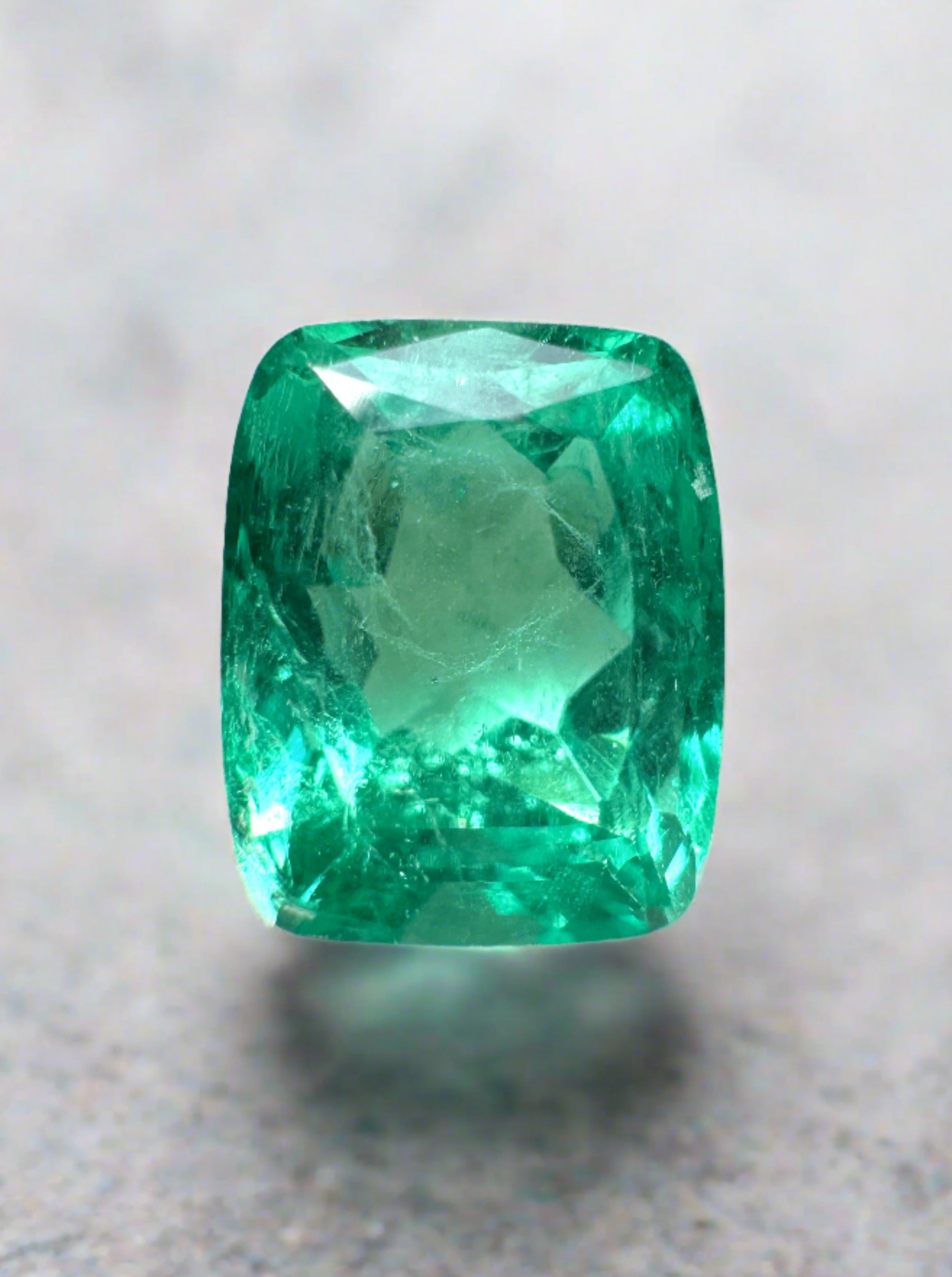 1.81 carat elongated cushion cut Colombian emerald natural loose gemstone from JR Colombian Emeralds, vibrant green and VVS clarity