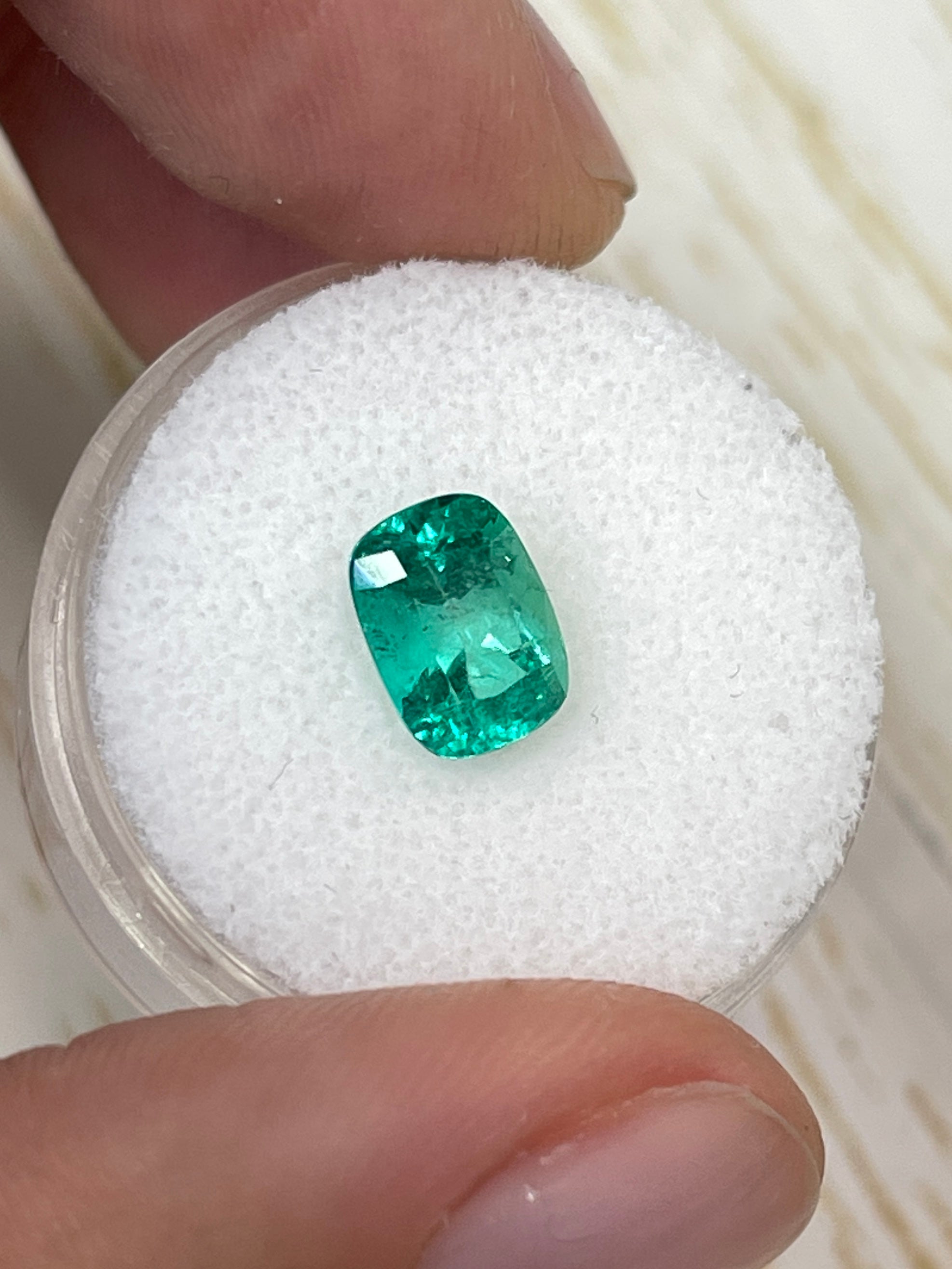 1.84 carat natural Colombian emerald, cushion cut, bluish green, loose gemstone from JR Colombian Emeralds.
