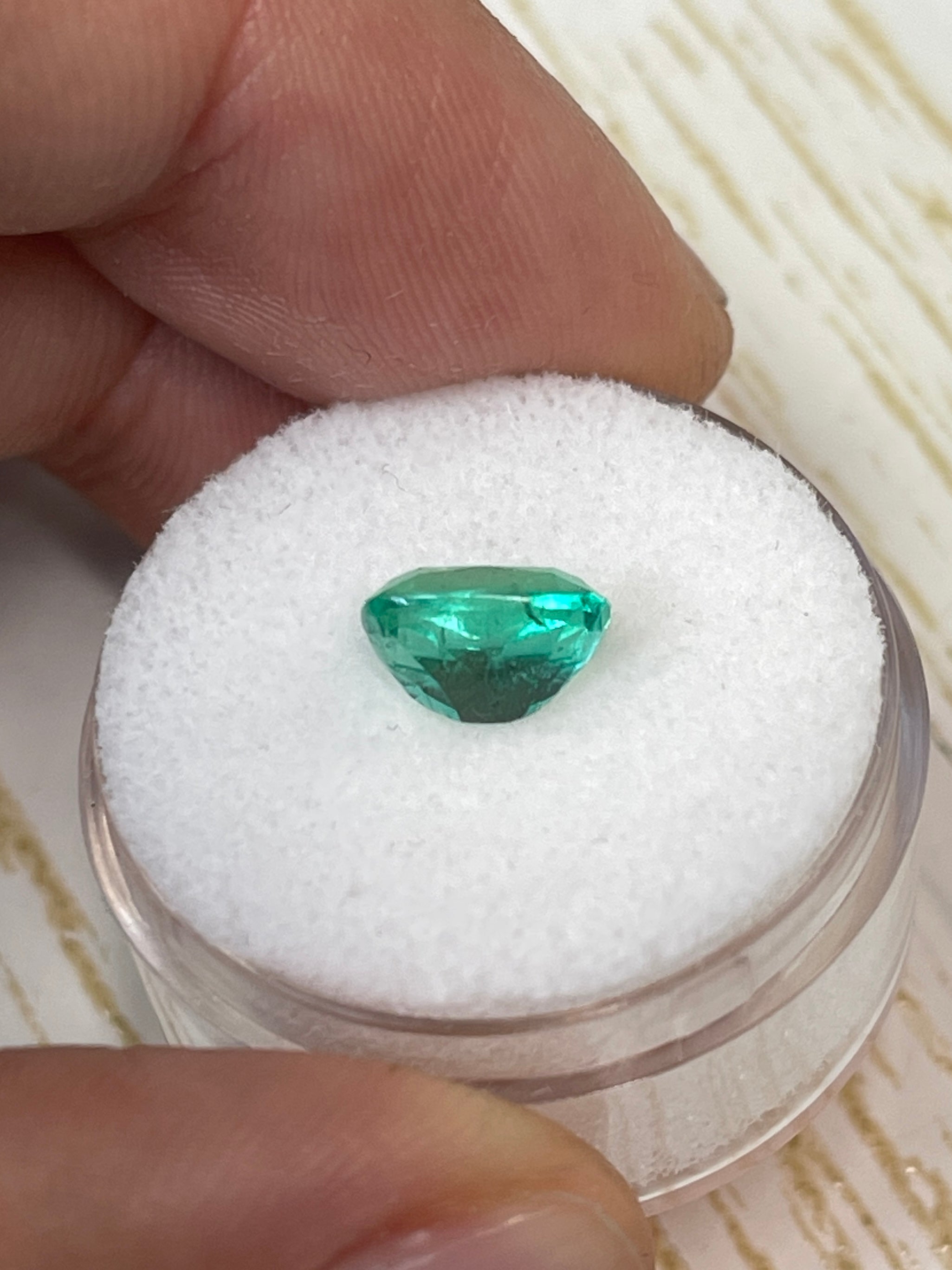 1.84 carat medium bluish green Colombian emerald loose cushion cut gemstone from JR Colombian Emeralds.