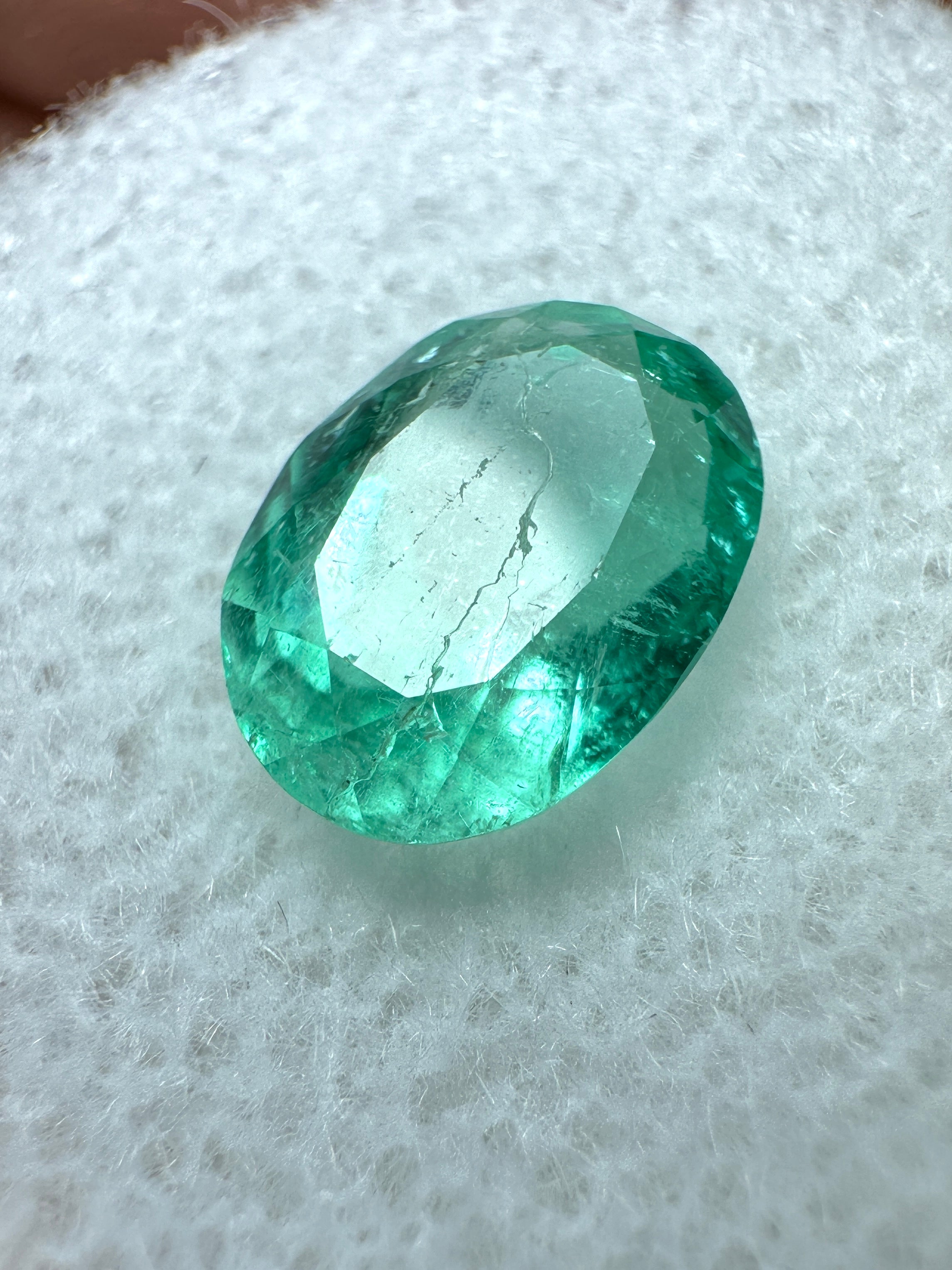 1.86 carat medium light green natural Colombian emerald in oval cut, loose gemstone from JR Colombian Emeralds.