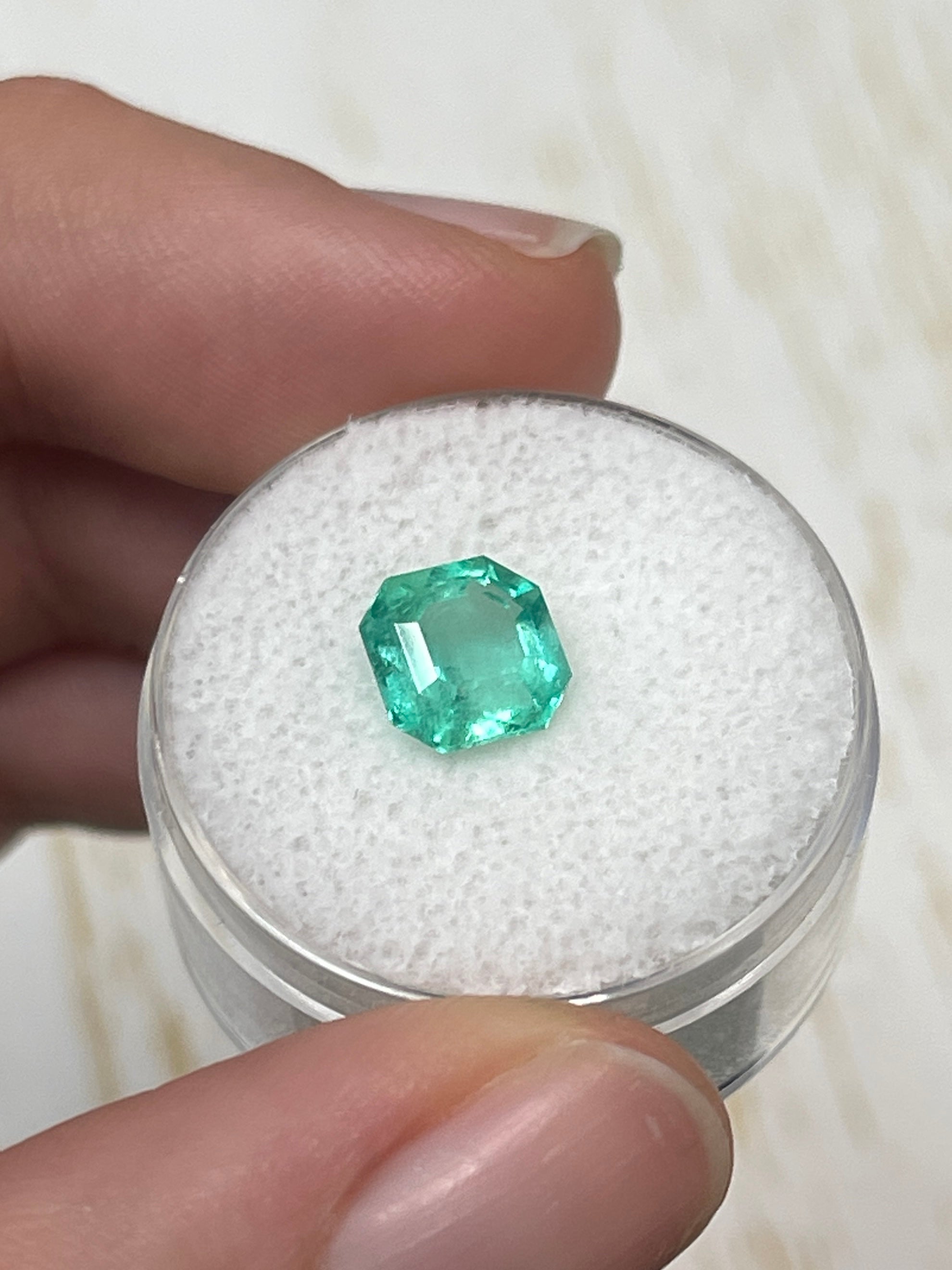 Natural 1.87 carat medium green Colombian emerald loose Asscher cut, showcasing art deco style from JR Colombian Emeralds.