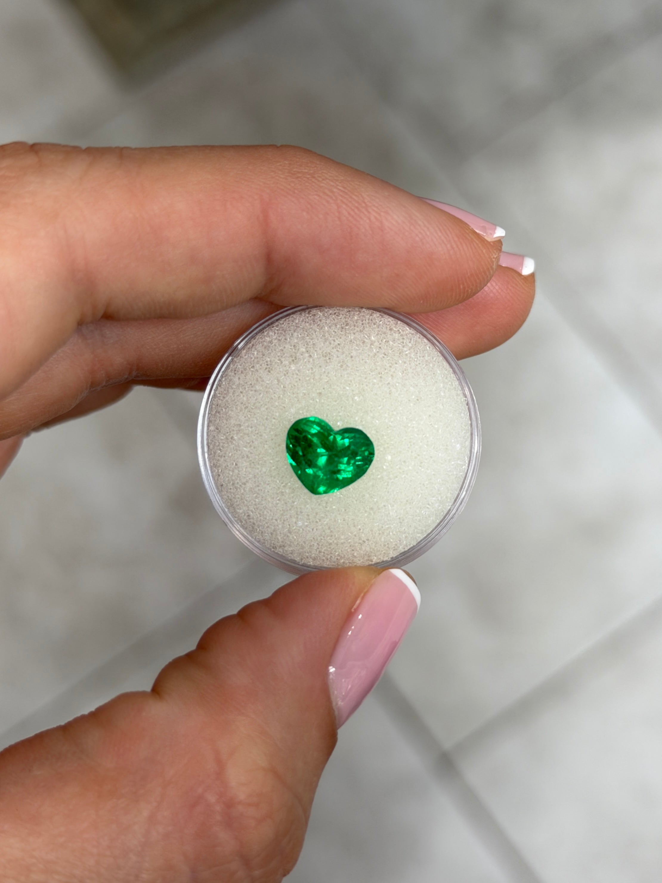 1.94 carat AAA+ vivid intense Muzo green Colombian emerald loose heart cut gemstone from JR Colombian Emeralds.
