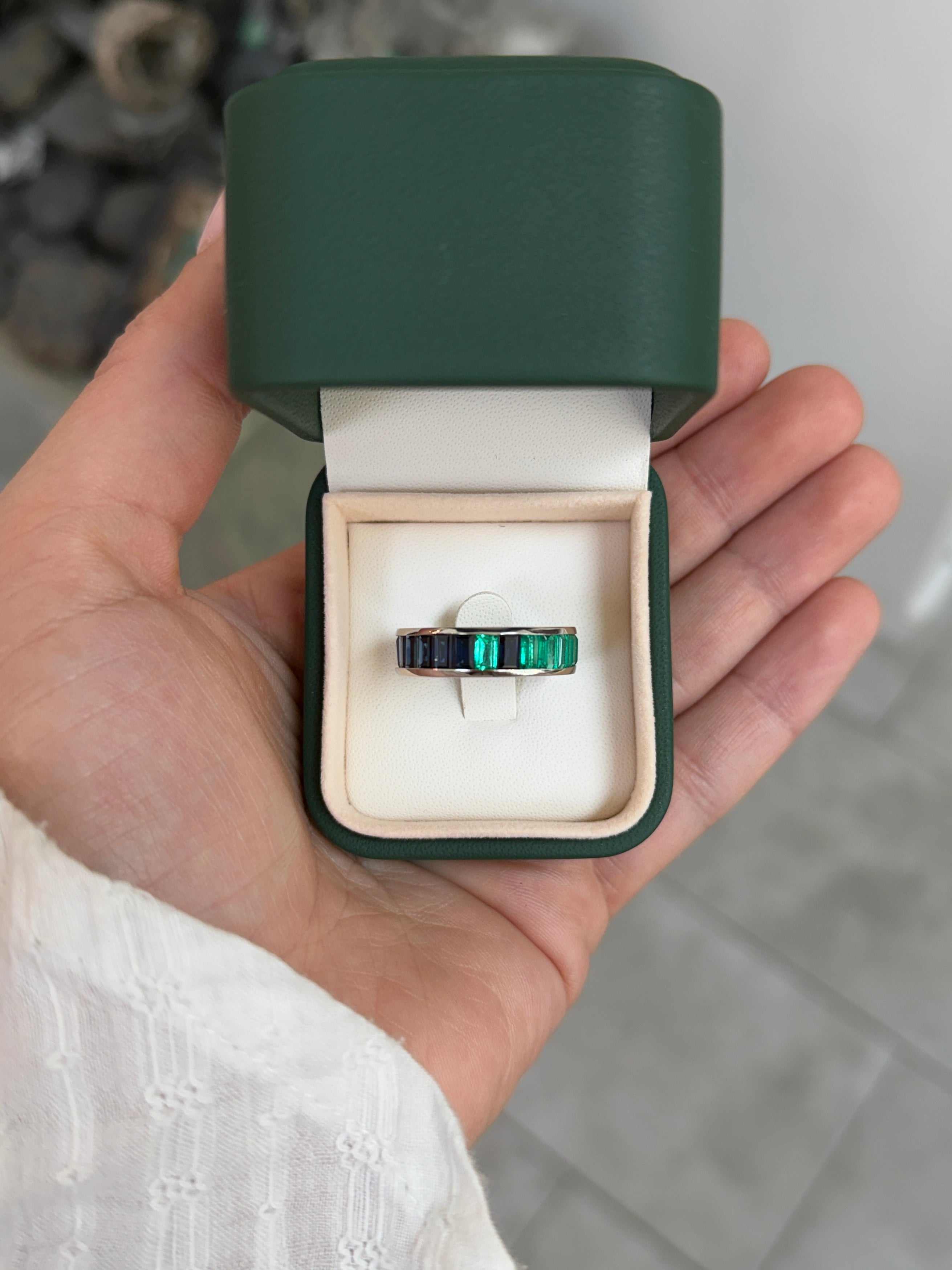 Platinum eternity band with 10.05tcw Colombian emeralds and blue sapphires, channel set in size 7, by JR Colombian Emeralds.
