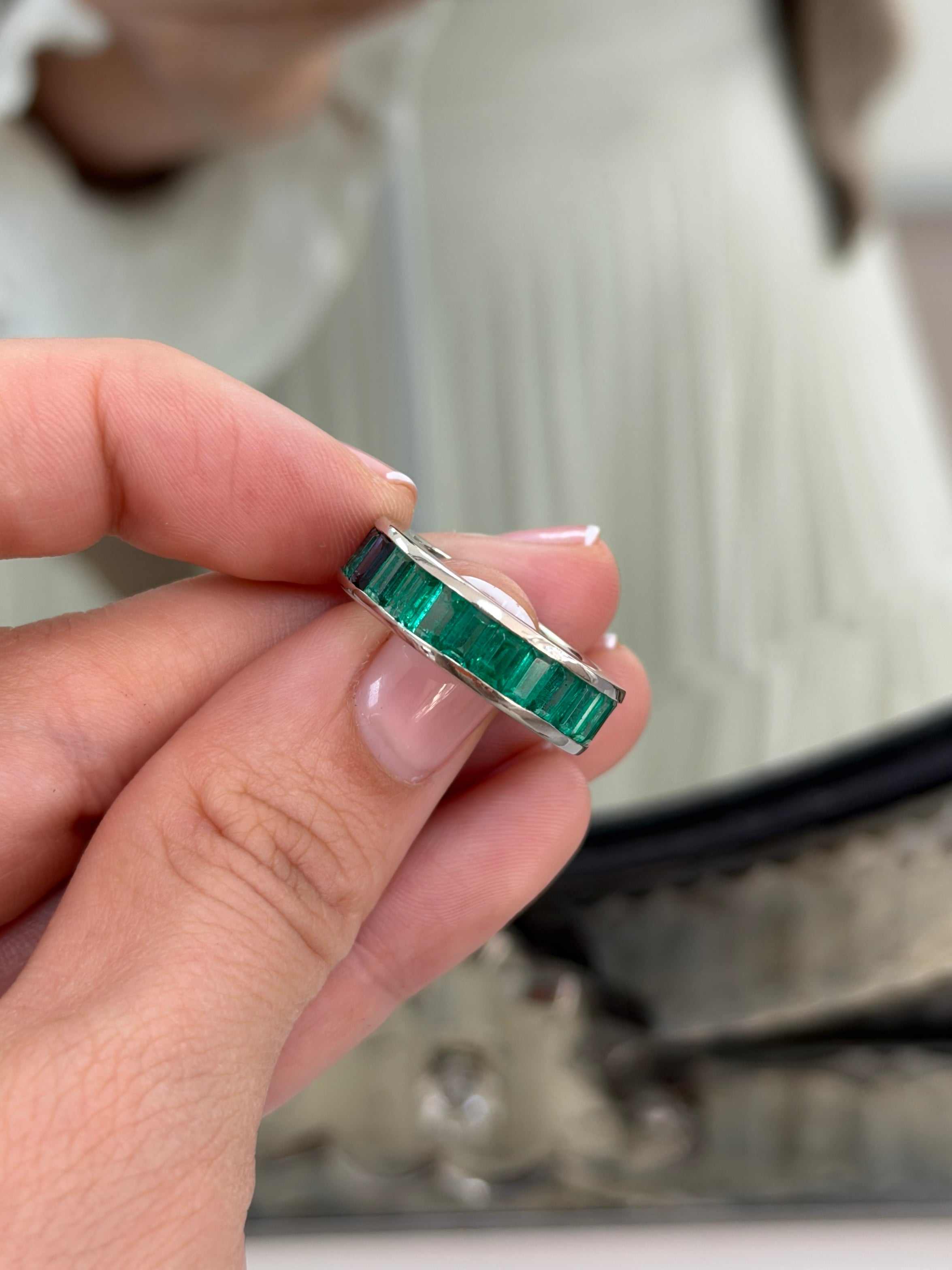 Platinum eternity band with 10.05tcw Colombian Emerald and blue sapphire baguette gemstones, size 7, by JR Colombian Emeralds.