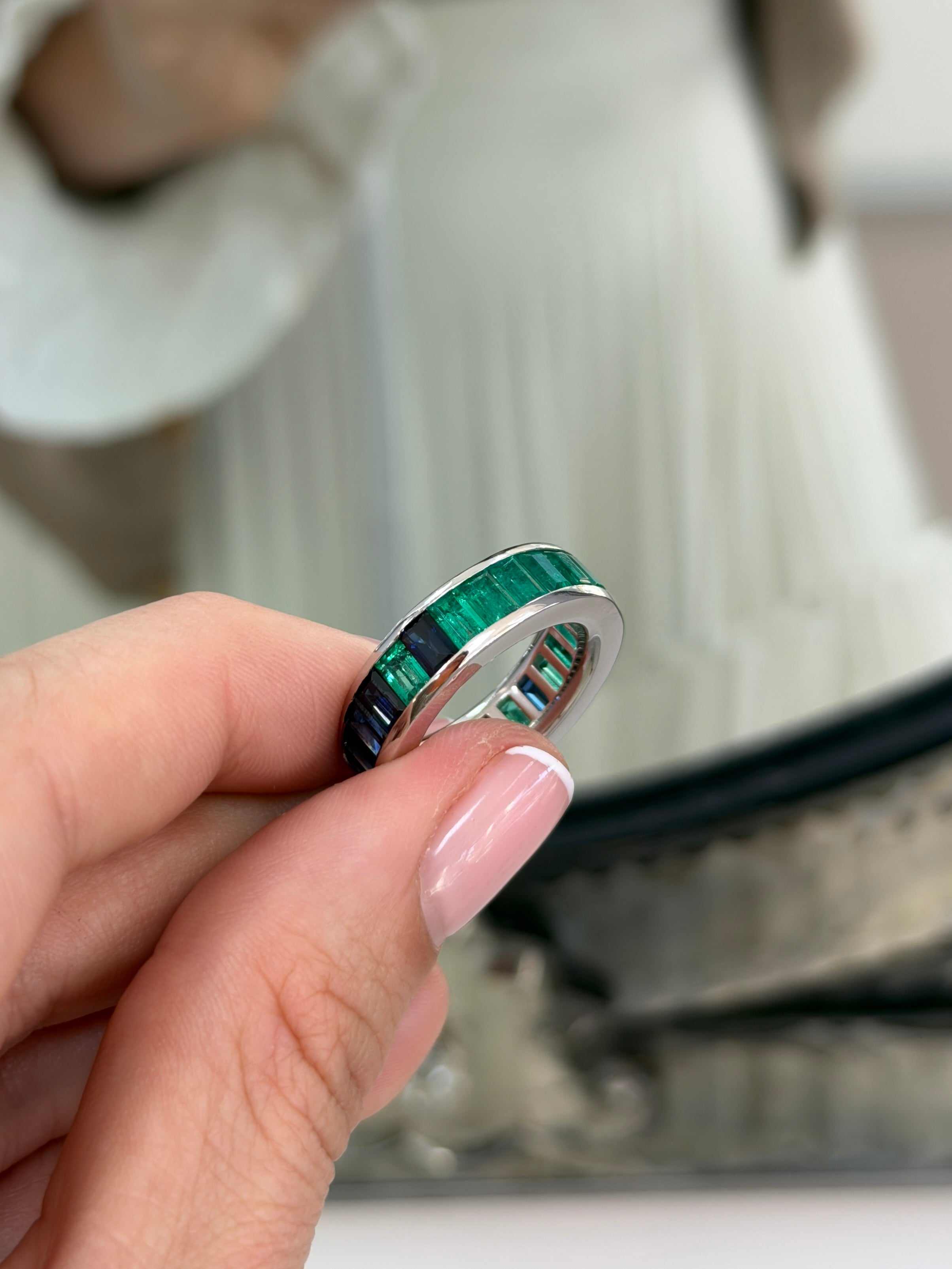 Platinum eternity band with 10.05tcw Colombian emerald and blue sapphire baguette stones, size 7, by JR Colombian Emeralds.