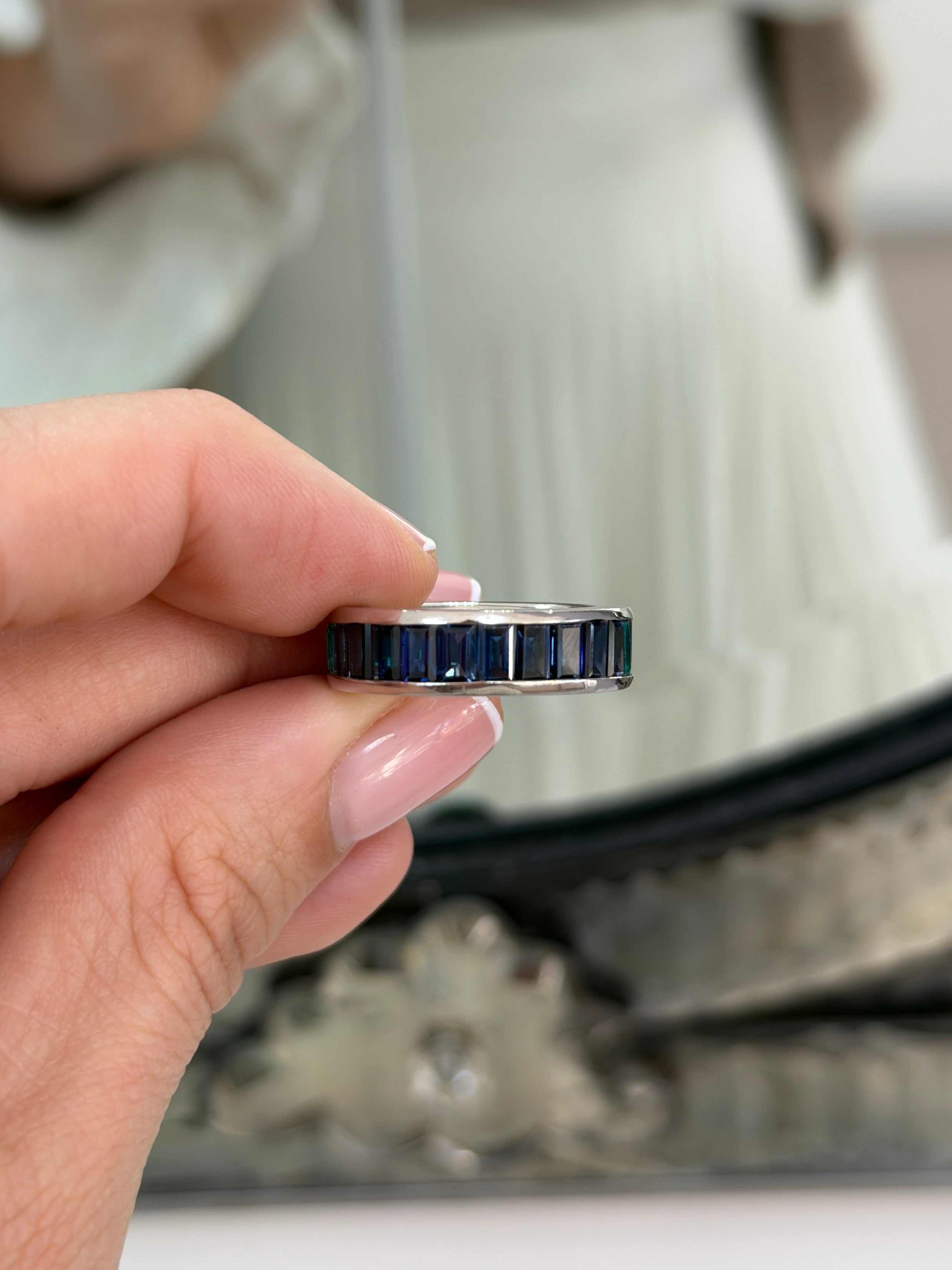 Platinum eternity band with 10.05tcw Colombian emeralds and blue sapphires, channel set, size 7, by JR Colombian Emeralds.