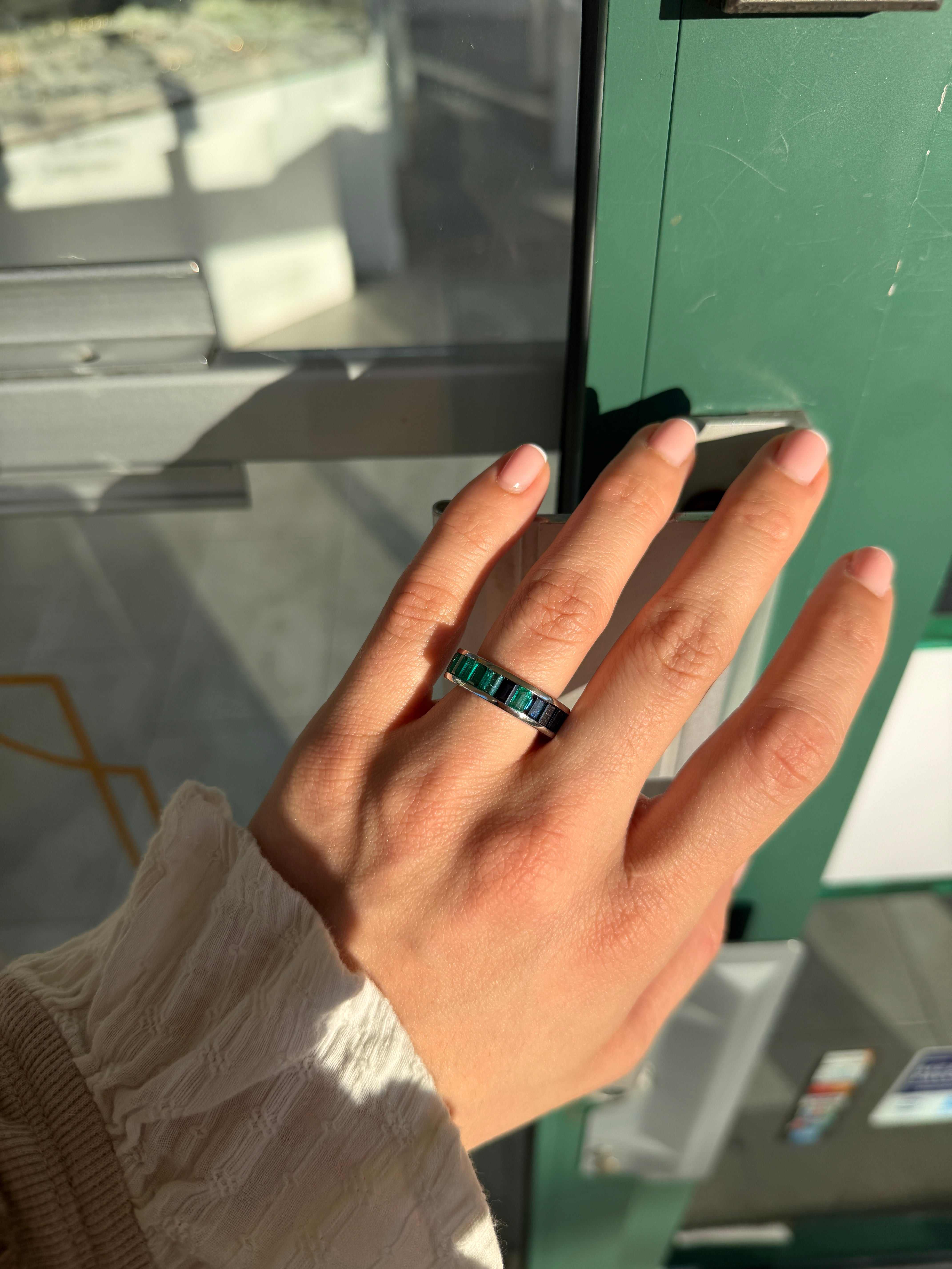 Platinum eternity band with 10.05tcw Colombian emeralds and blue sapphires in channel setting, size 7, by JR Colombian Emeralds.