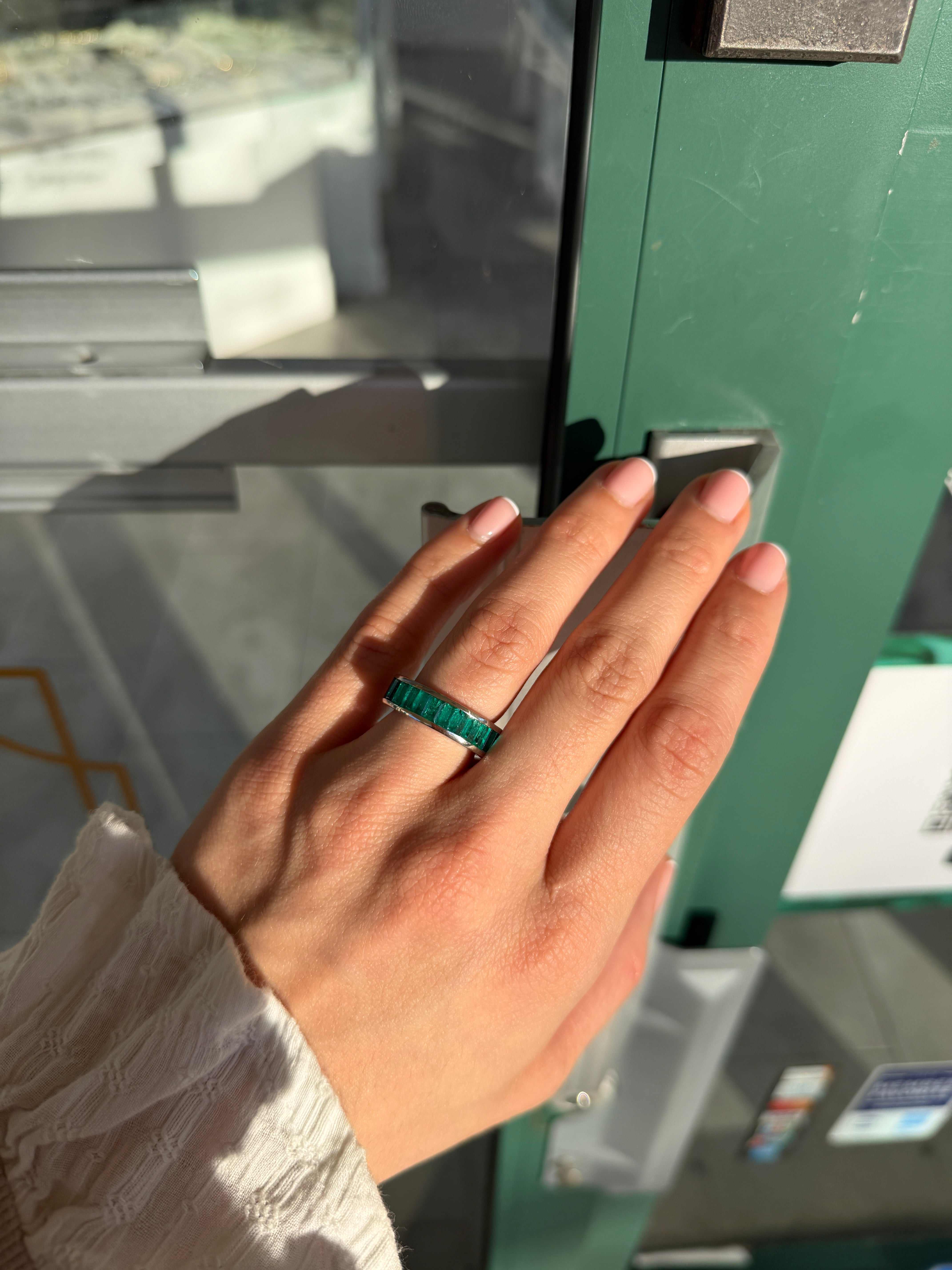 Platinum eternity band with 10.05tcw Colombian emeralds and blue sapphires, channel set, size 7, by JR Colombian Emeralds.