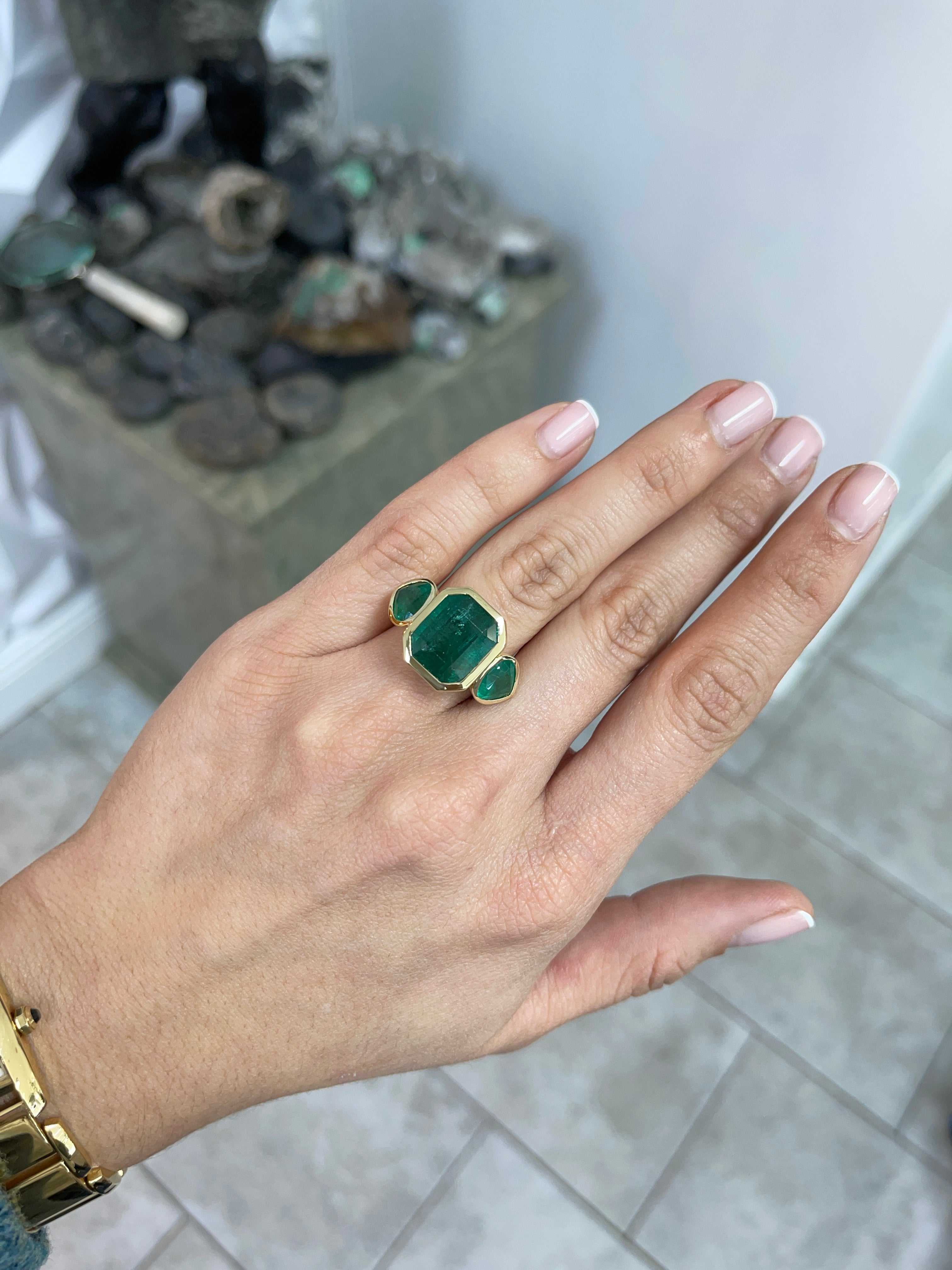 15.44tcw Emerald Cut Emerald and Pear Accents 3 Stone Bezel Ring 18K Gold