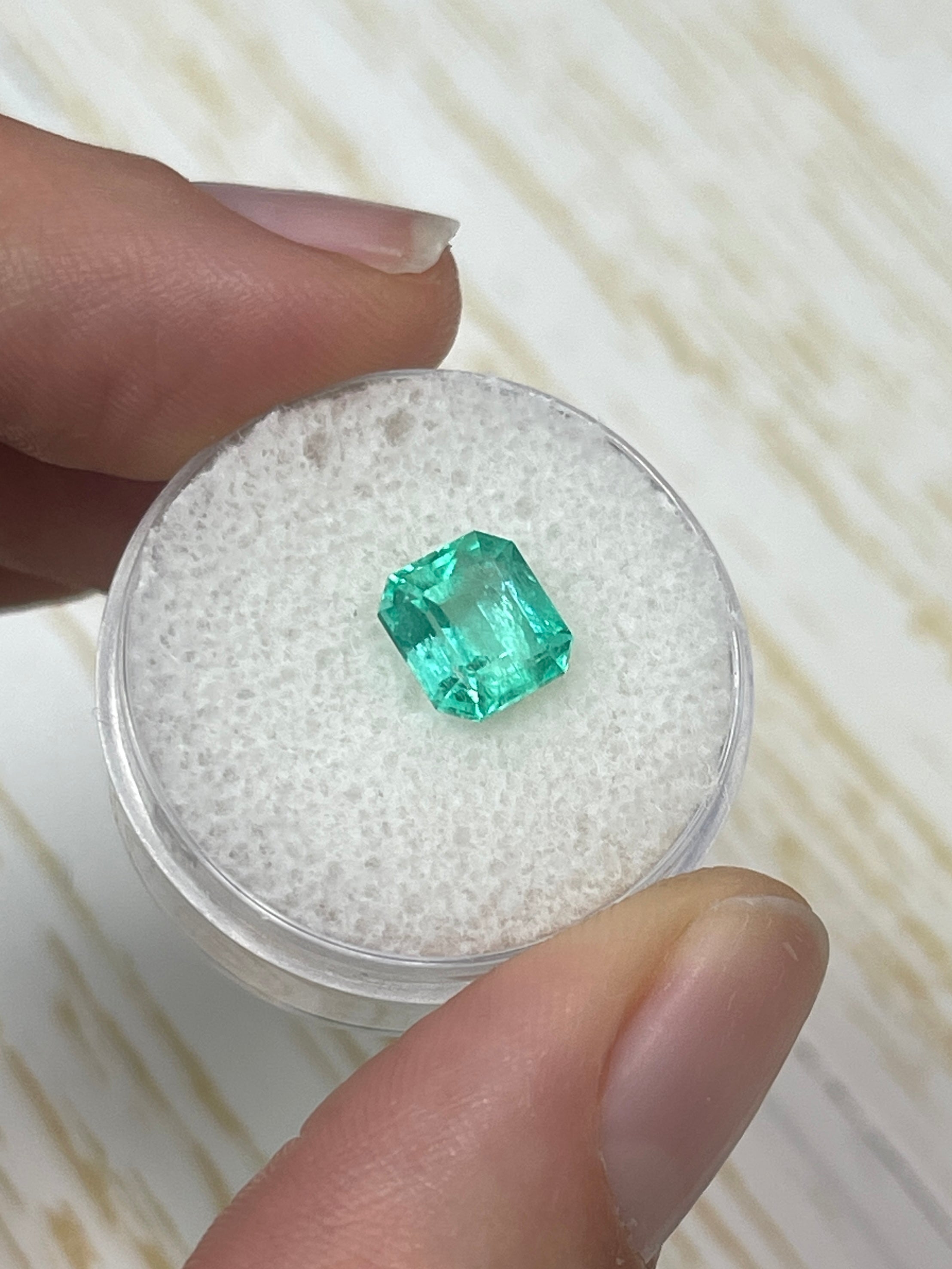 2.03 carat bluish green Colombian emerald cut natural emerald gemstone from JR Colombian Emeralds, eye clean and unset.