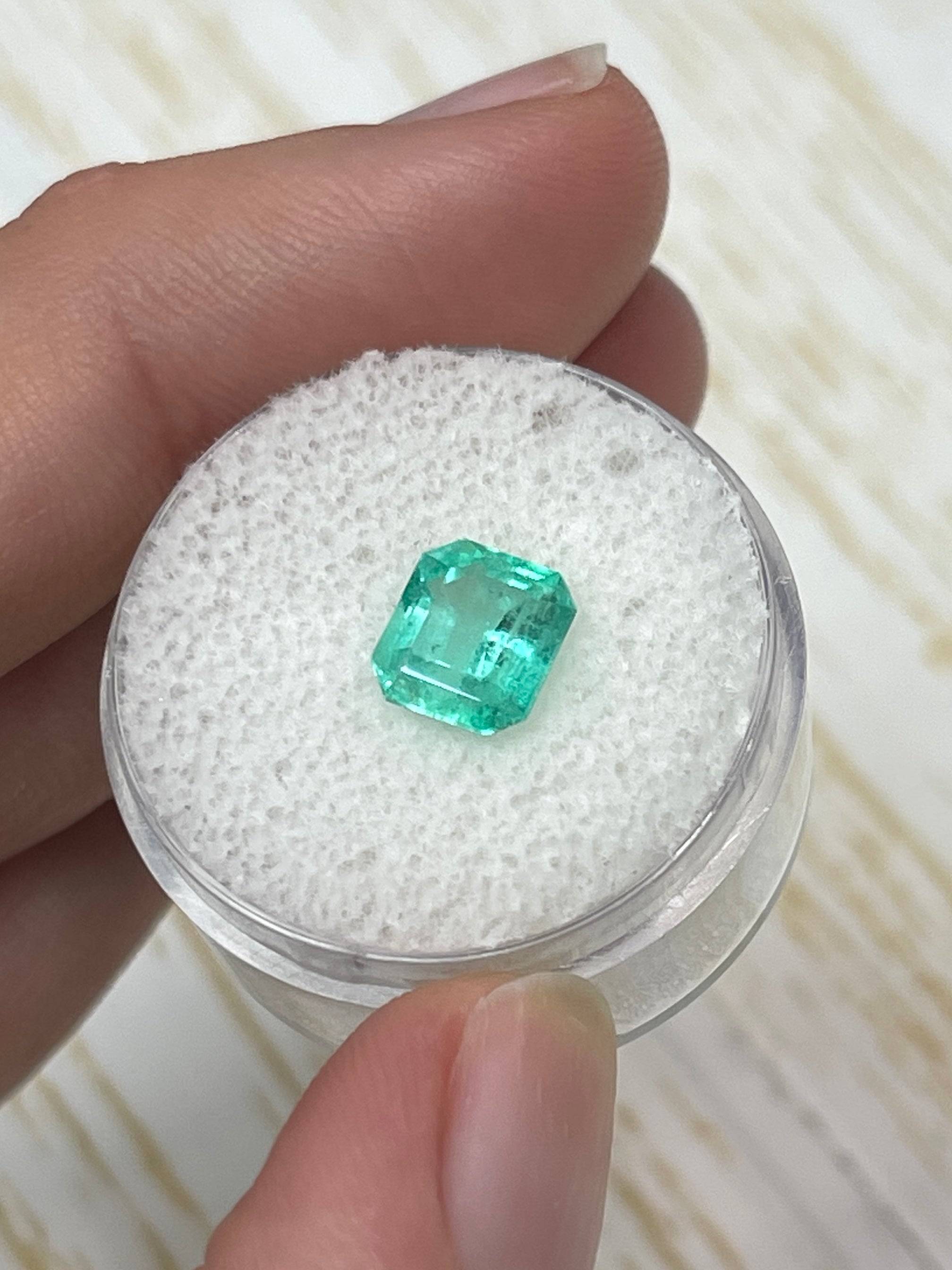 2.03 carat bluish green Colombian emerald cut natural emerald from JR Colombian Emeralds, eye-clean and unset.