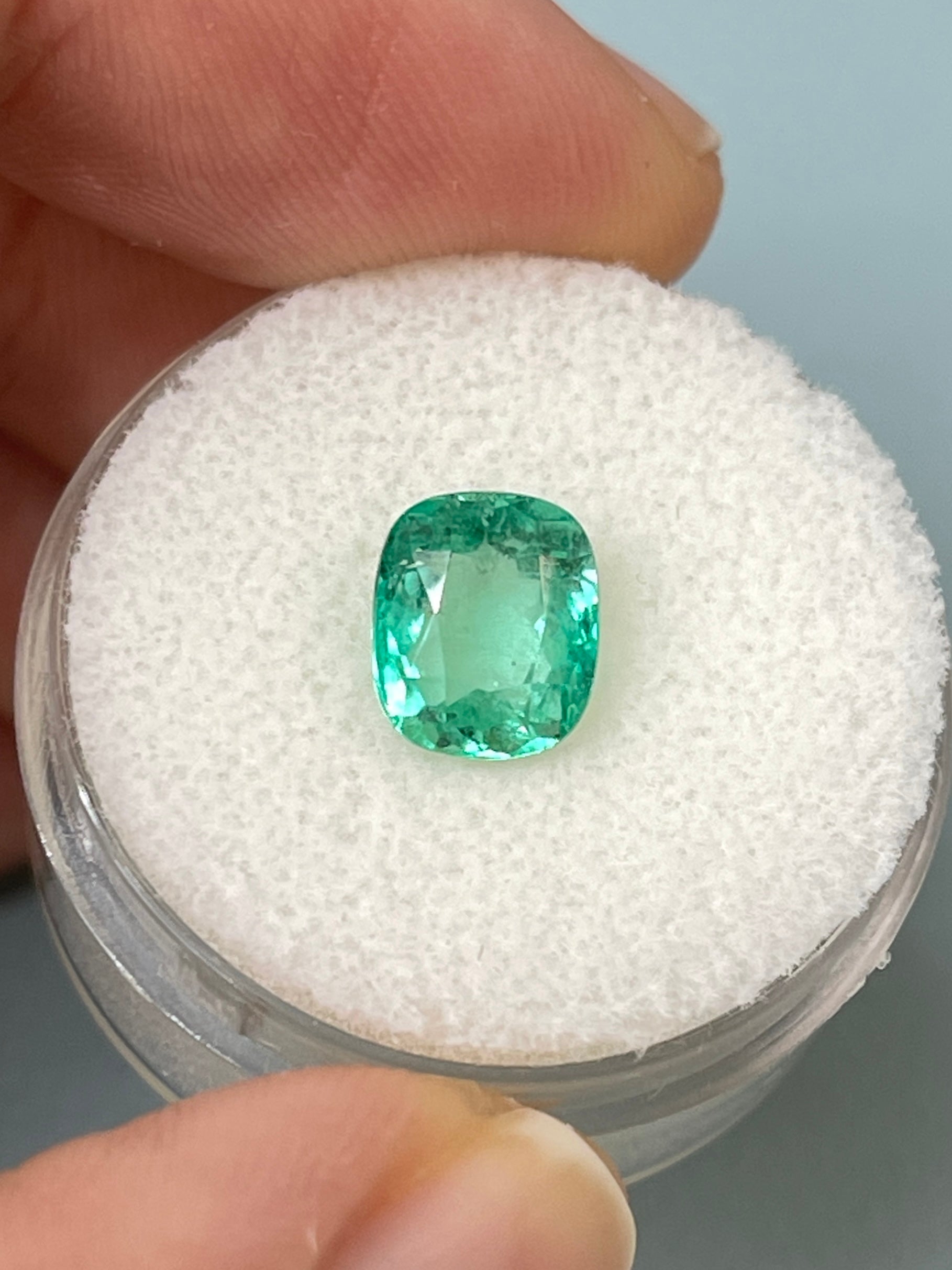 2.06 carat minty bluish-green natural Colombian emerald loose cushion cut gemstone from JR Colombian Emeralds.