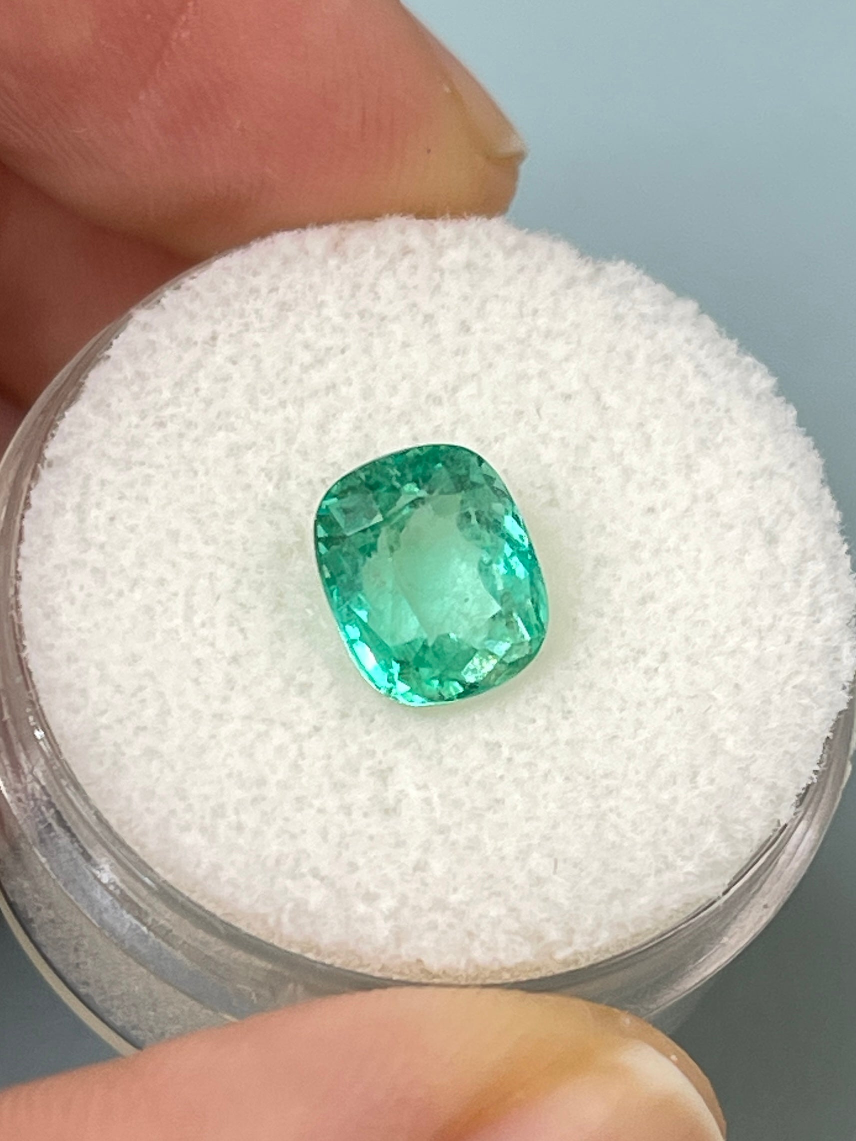 Natural loose Colombian emerald, 2.06 carats, cushion cut, minty bluish green, from JR Colombian Emeralds.