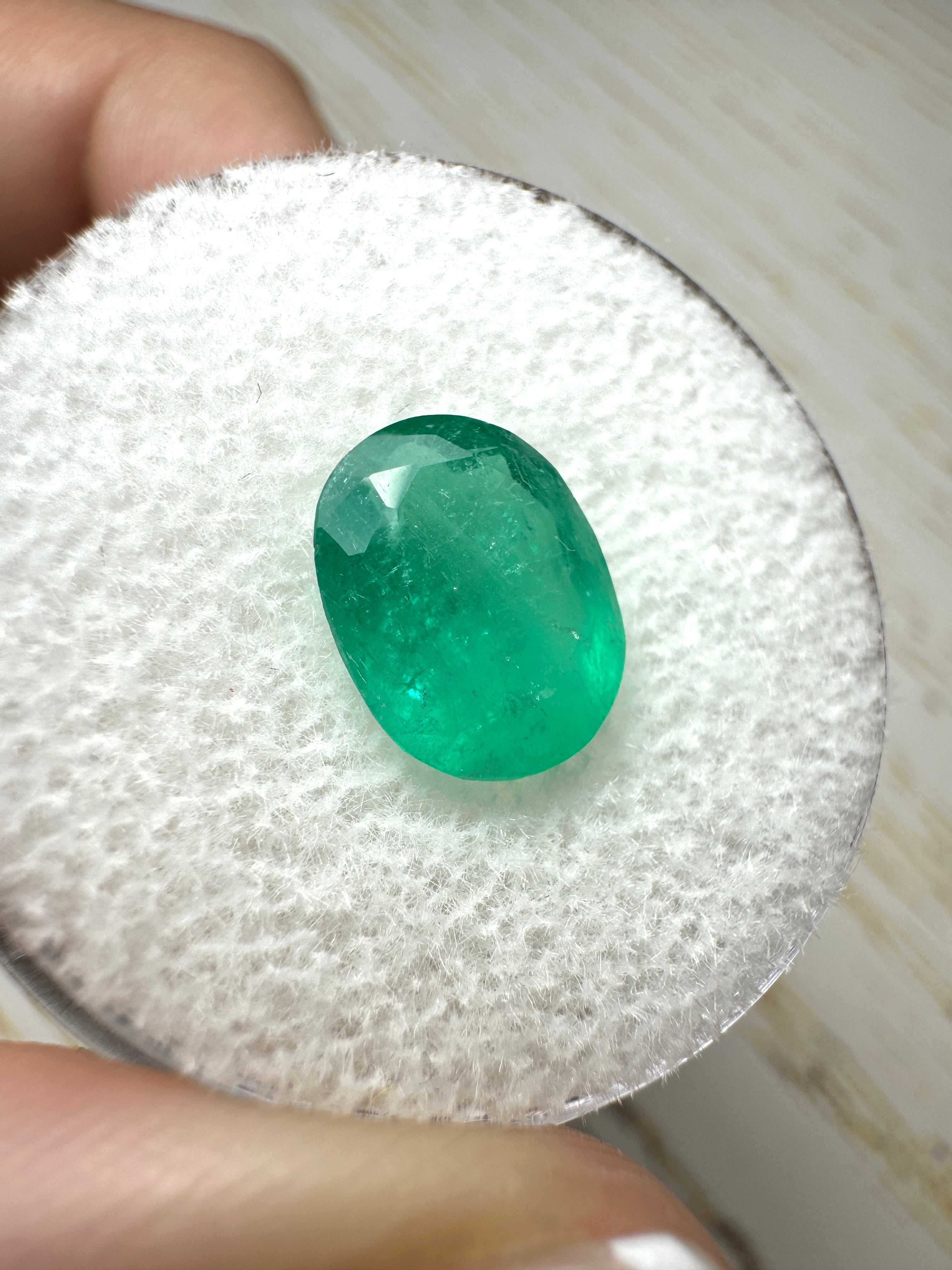 Medium bluish green 2.11 carat oval cut Colombian emerald loose gemstone by JR Colombian Emeralds.
